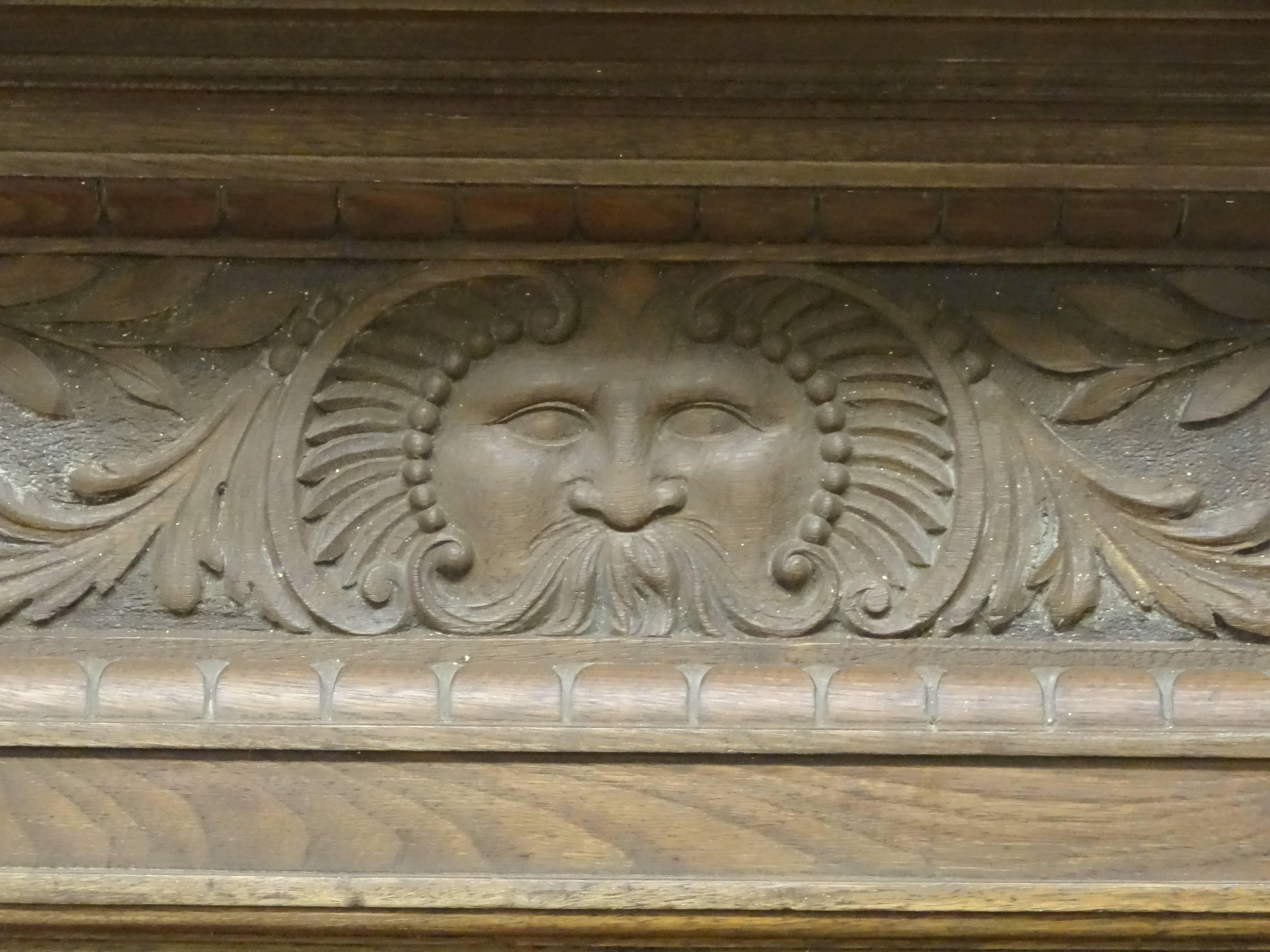 19th Century Victorian Stripped Walnut Fire Surround with Carved Sun God In Good Condition For Sale In Lurgan, Northern Ireland