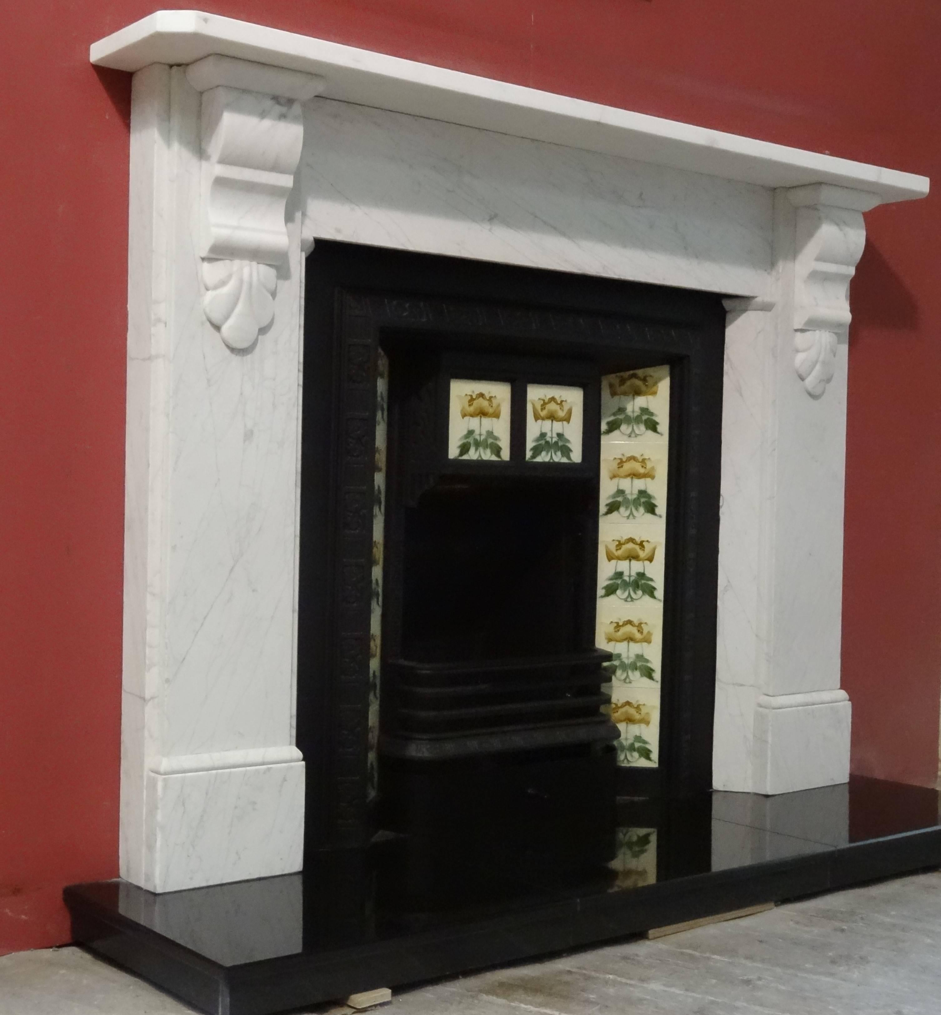 19th century Victorian white Carrara marble chimney piece. Reclaimed from a Victorian property in County Tyrone Northern Ireland. Cast iron tiled Insert, granite hearth shown are sold separately.

Fire surround internal aperture:
Measure: Width