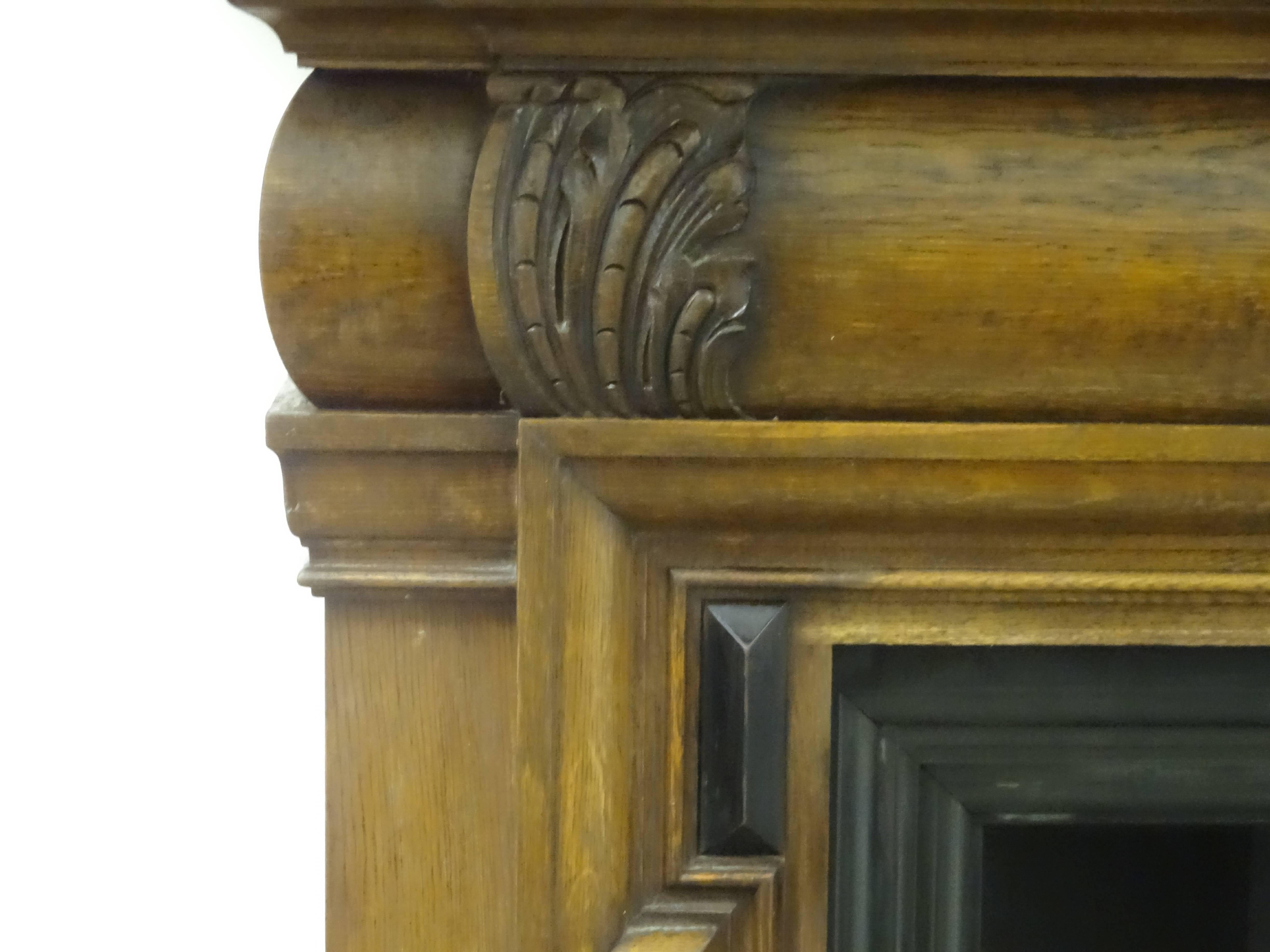 19th Century Victorian Carved Oak and Ebony Bolection Fire Surround For Sale 1