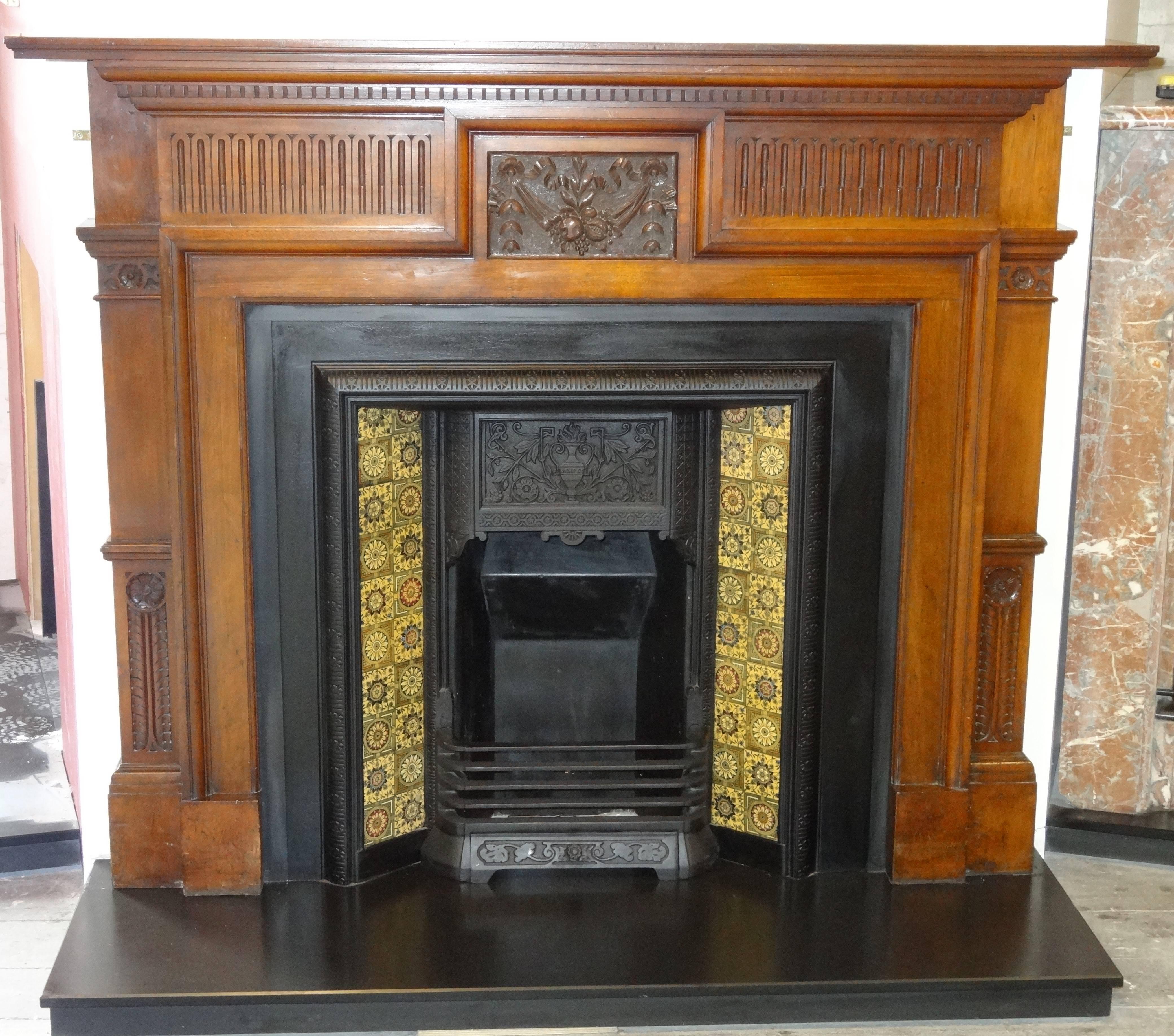 Antique Edwardian Hand Carved Walnut Fireplace Surround, reclaimed from an Edwardian property in County Antrim Northern Ireland. In original condition.
Slate Hearth and Cast Iron Insert sold separately.

Aperture Measurements:
Width 41