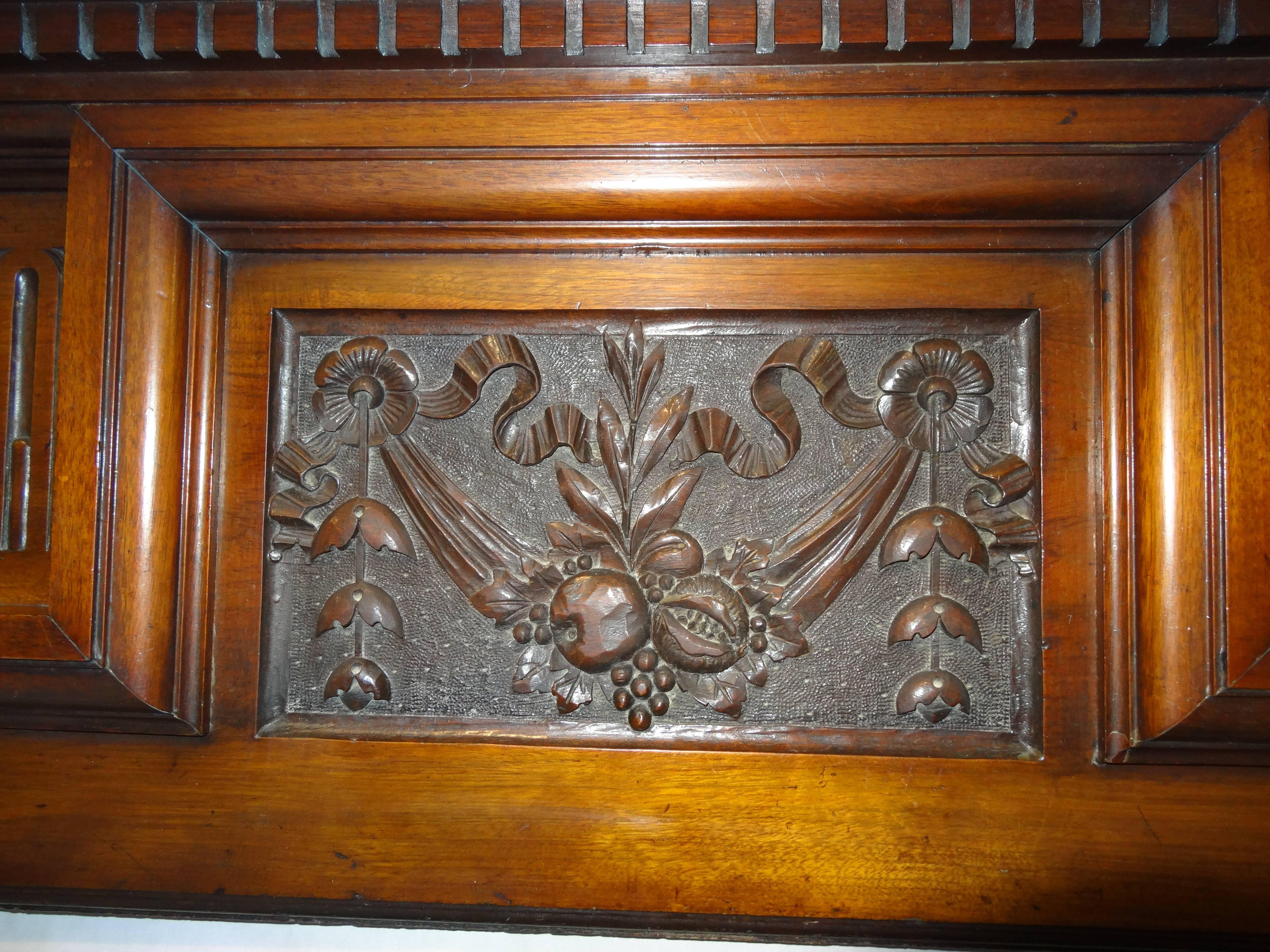 Northern Irish Irish Early 20th Century Edwardian Hand-Carved Walnut Fireplace Surround For Sale