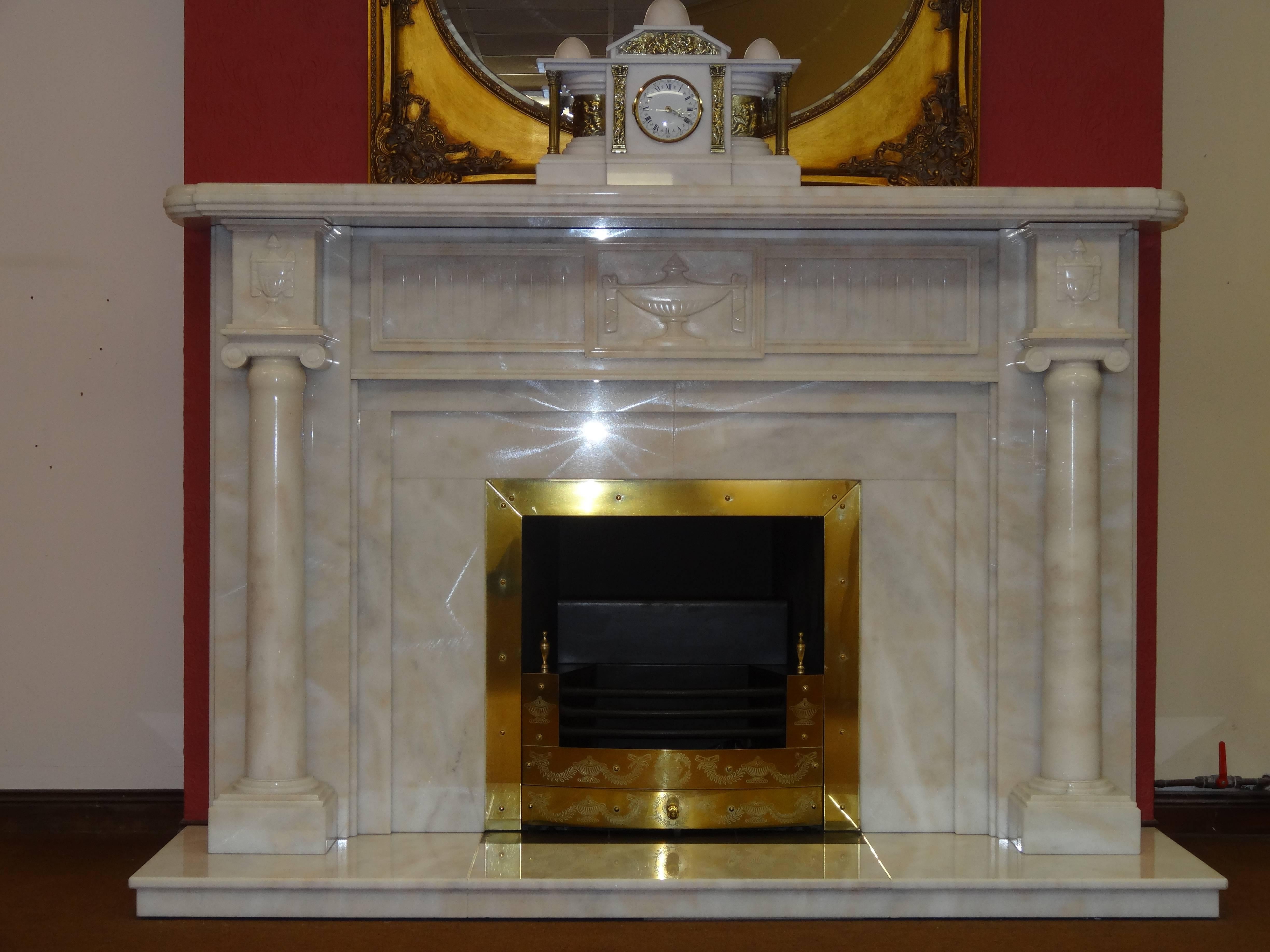 Northern Irish Irish 21st Century Carved Marble Adam Style Fireplace with Brass Fire Basket For Sale