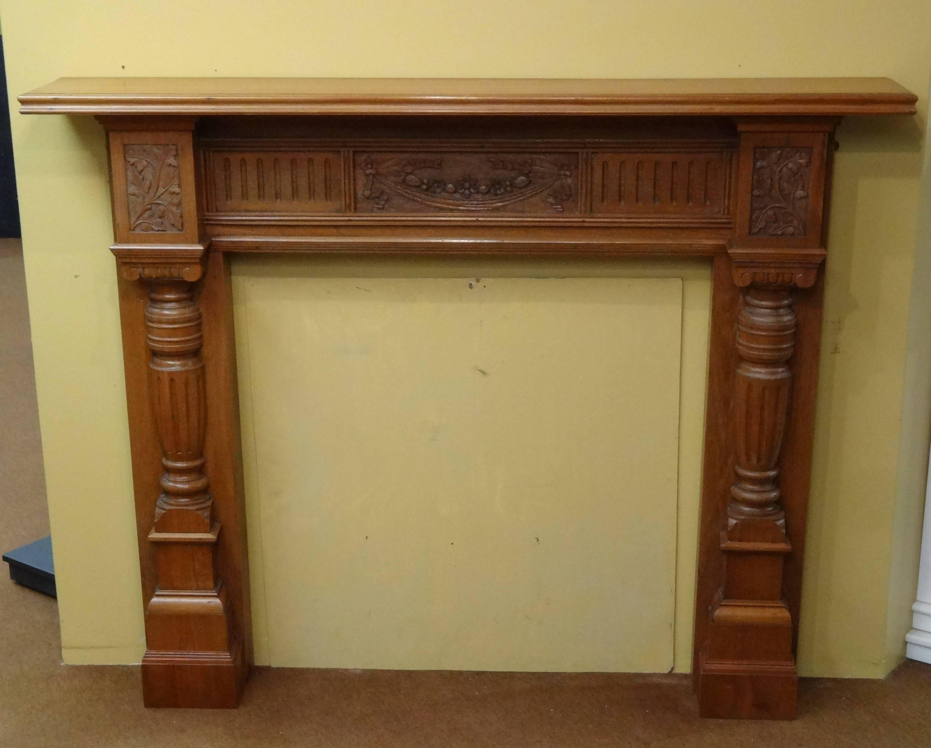 Reclaimed antique Edwardian hand-carved mahogany fireplace surround. In original reclaimed condition.

Approximate measurements:
Mantel width 68 inches / 172.7 cm
Mantel depth 10.25 inches / 26 cm
Height 53.5 inches / 135.8 cm
Base 57 inches /