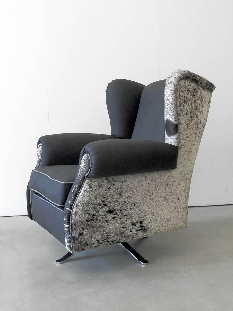 The design of this swivel armchair incorporates the classic and refined lines of French bergére revisited with modern and light style. Bergére is synonymous with comfort while the sophisticated choice of this patchwork upholstery – composed of