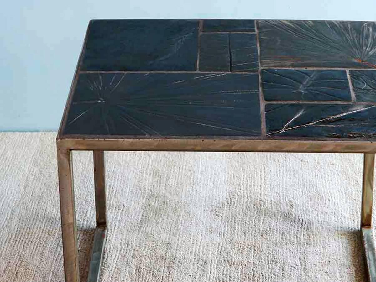 This glazed ceramic coffee table is a unique piece made by the Italian artist Roberta Colombo. Each tile is handmade and has casts of different kind of leaves.
Heat and water resistant, this small and elegant coffee table is a piece of furniture