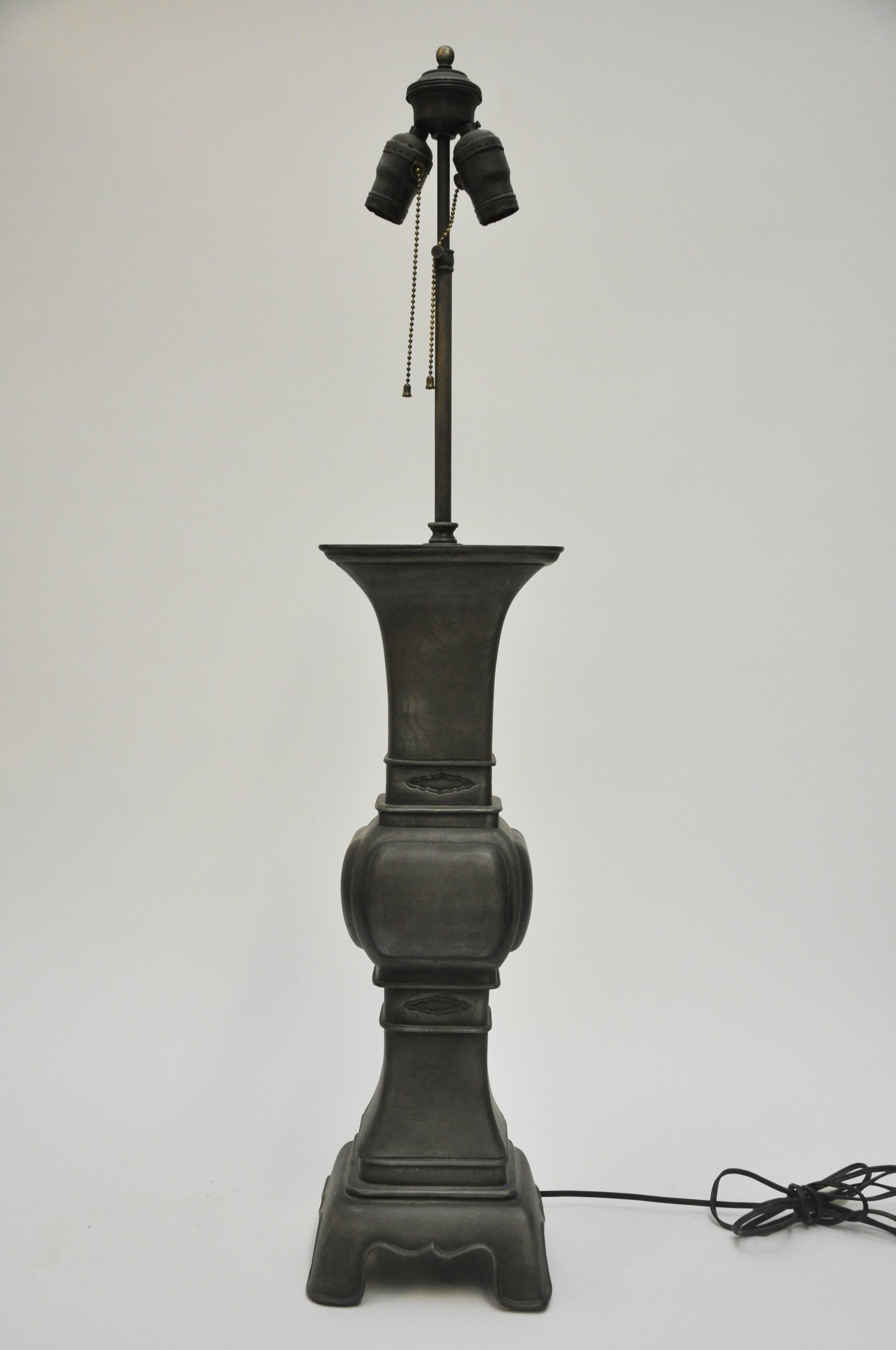 Pair of tall Chinese pewter altar stick as lamps.