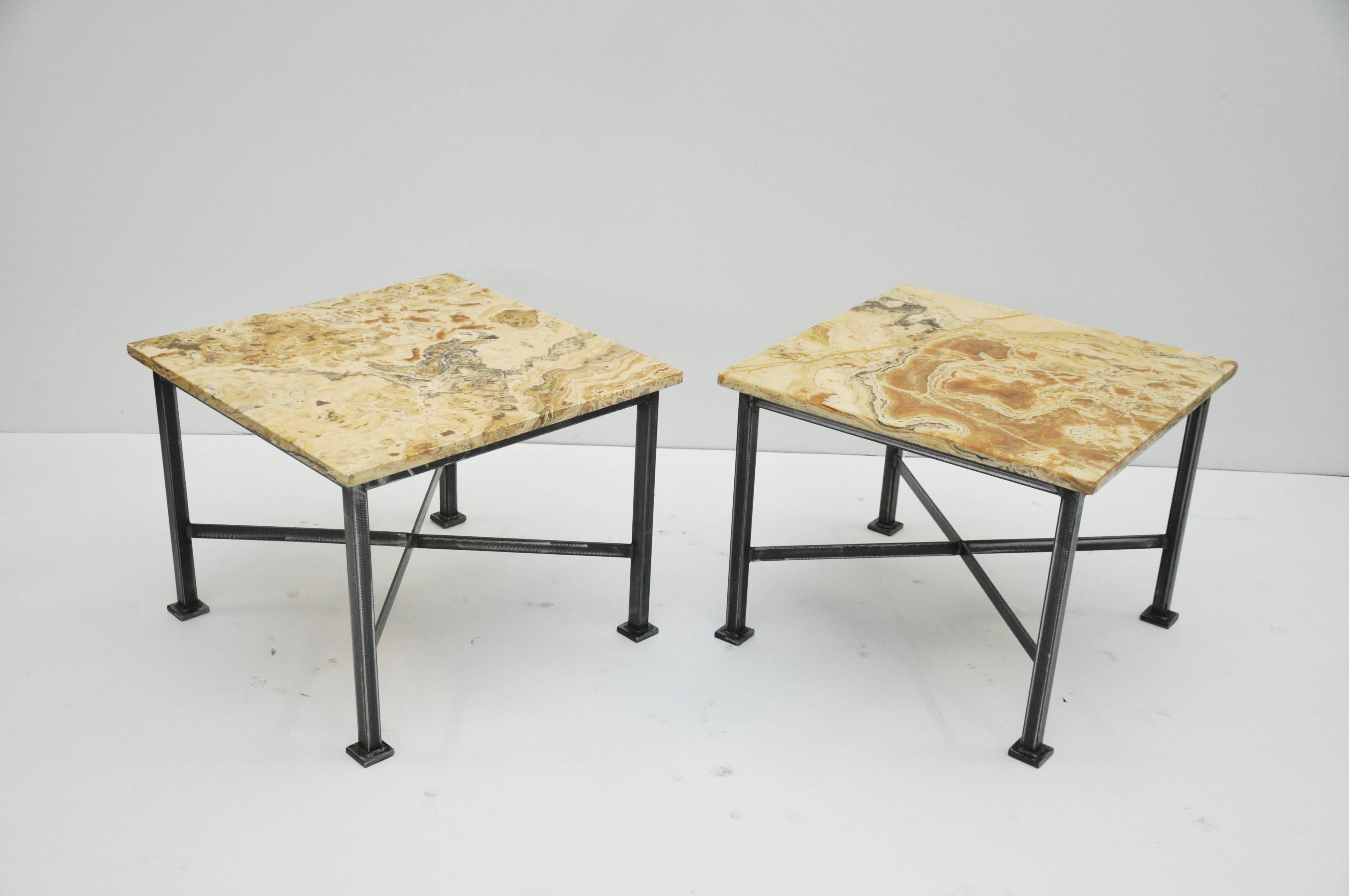 These vintage slabs of marble were mounted on custom iron bases. The marble has a stunning coloration there are no markings as to where the marble originated. Marble is from the mid-20th century off taken off of midcentury wooden tables. Custom