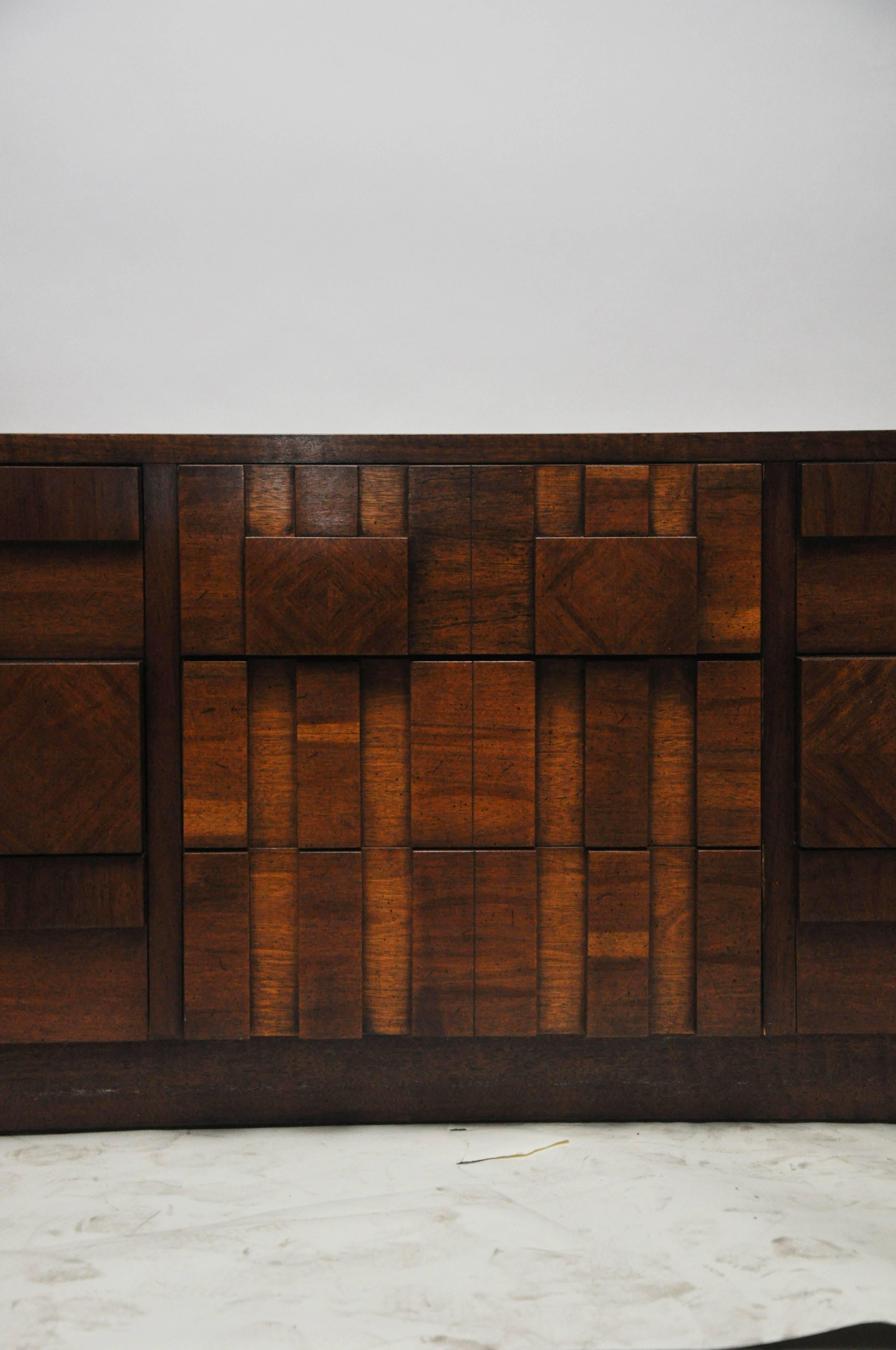 Mosaic line Brutalist pattern by Lane Furniture. Nine deep drawers. The piece is walnut and in very clean condition.