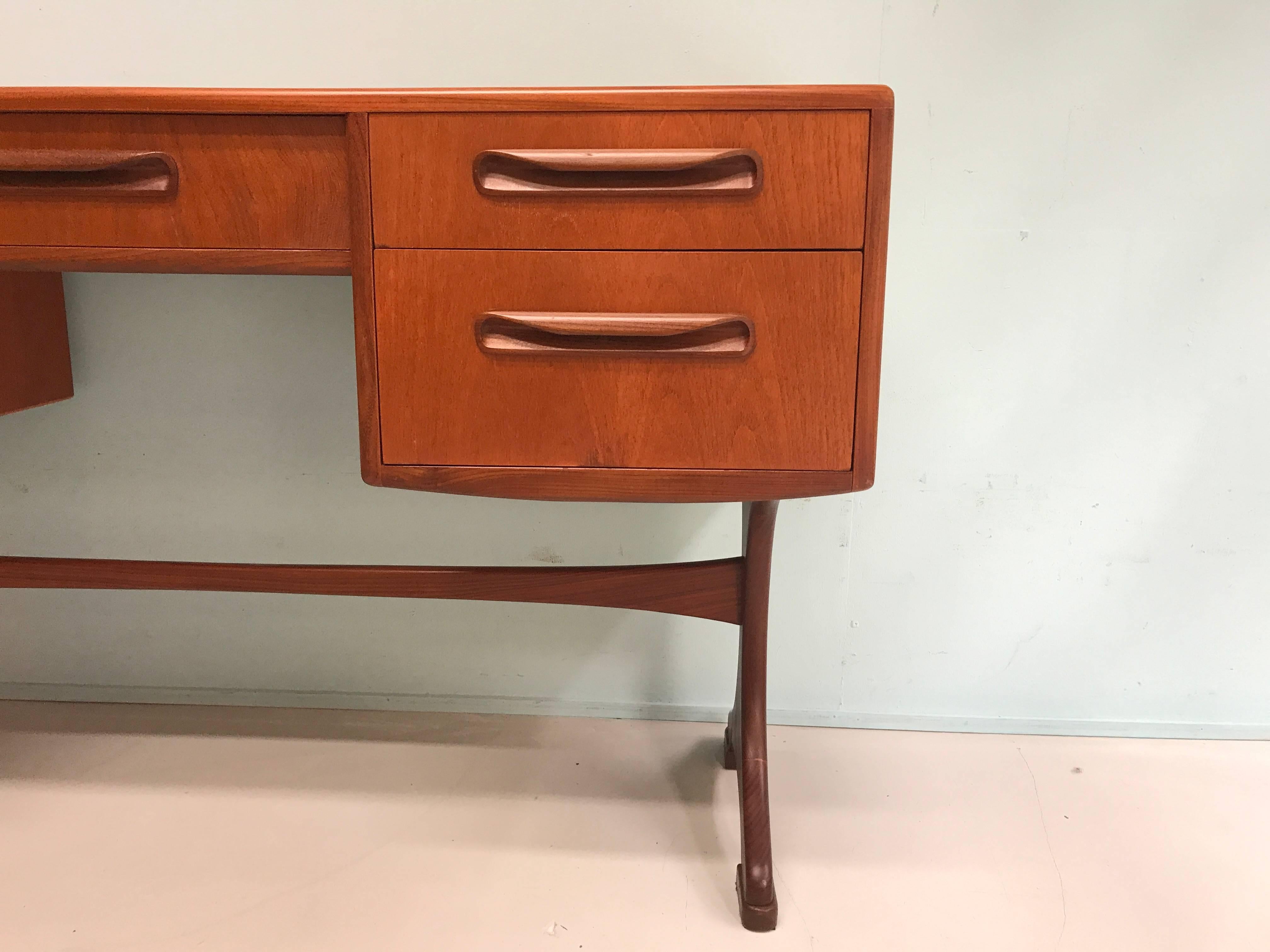 Stunning and rare teak desk made by G-Plan from England.
Period: circa 1965.
Condition: Excellent.


           