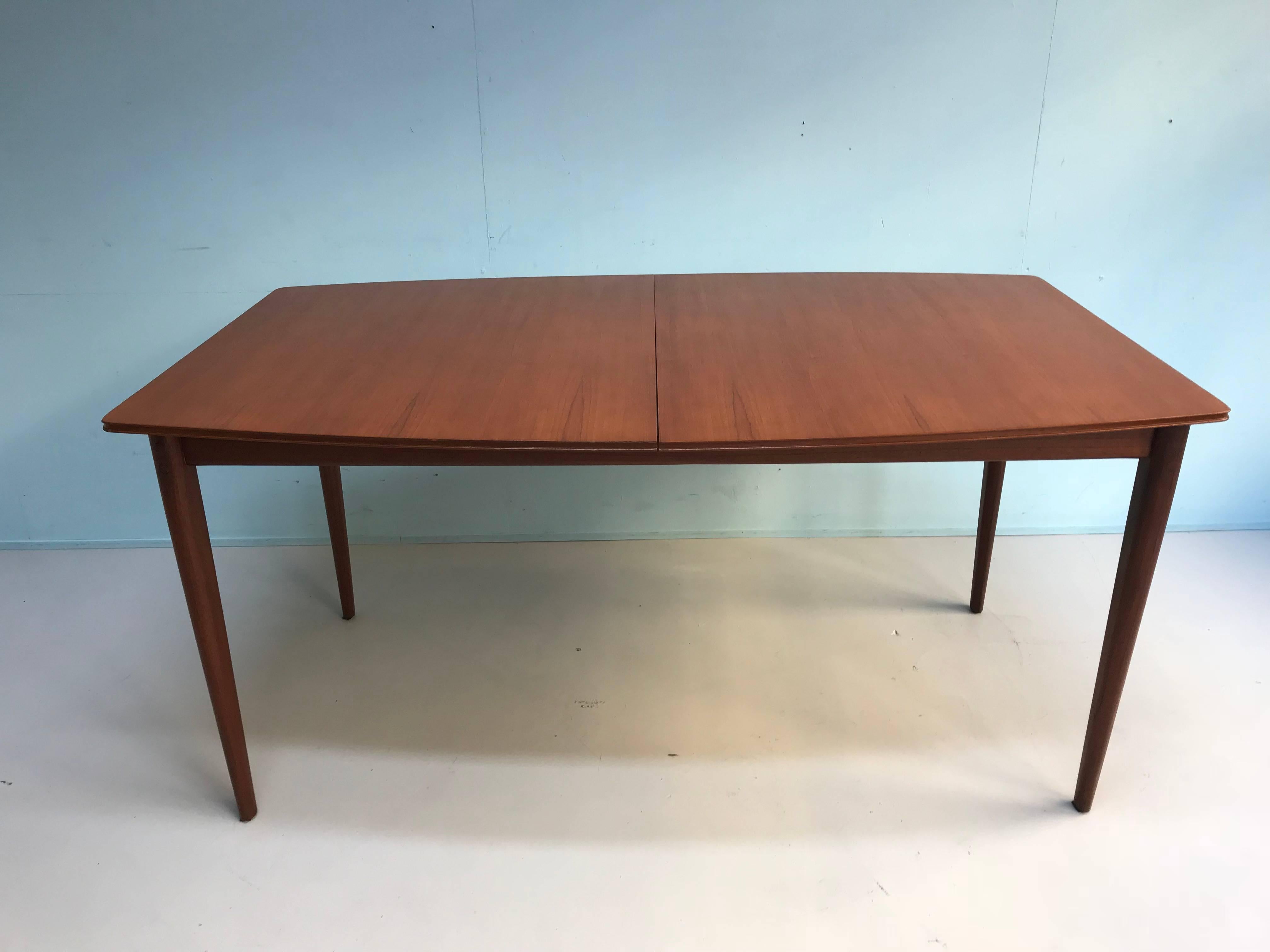 Macintosh dining table made of teak in a good condition.
Very genius system to make the table longer in two steps.
Condition: very good
period: 1960s

Measurements:
Normal:
152 cm W/91cm D/74 cm H
One step :
192 cm W/91 D/74 H
Two