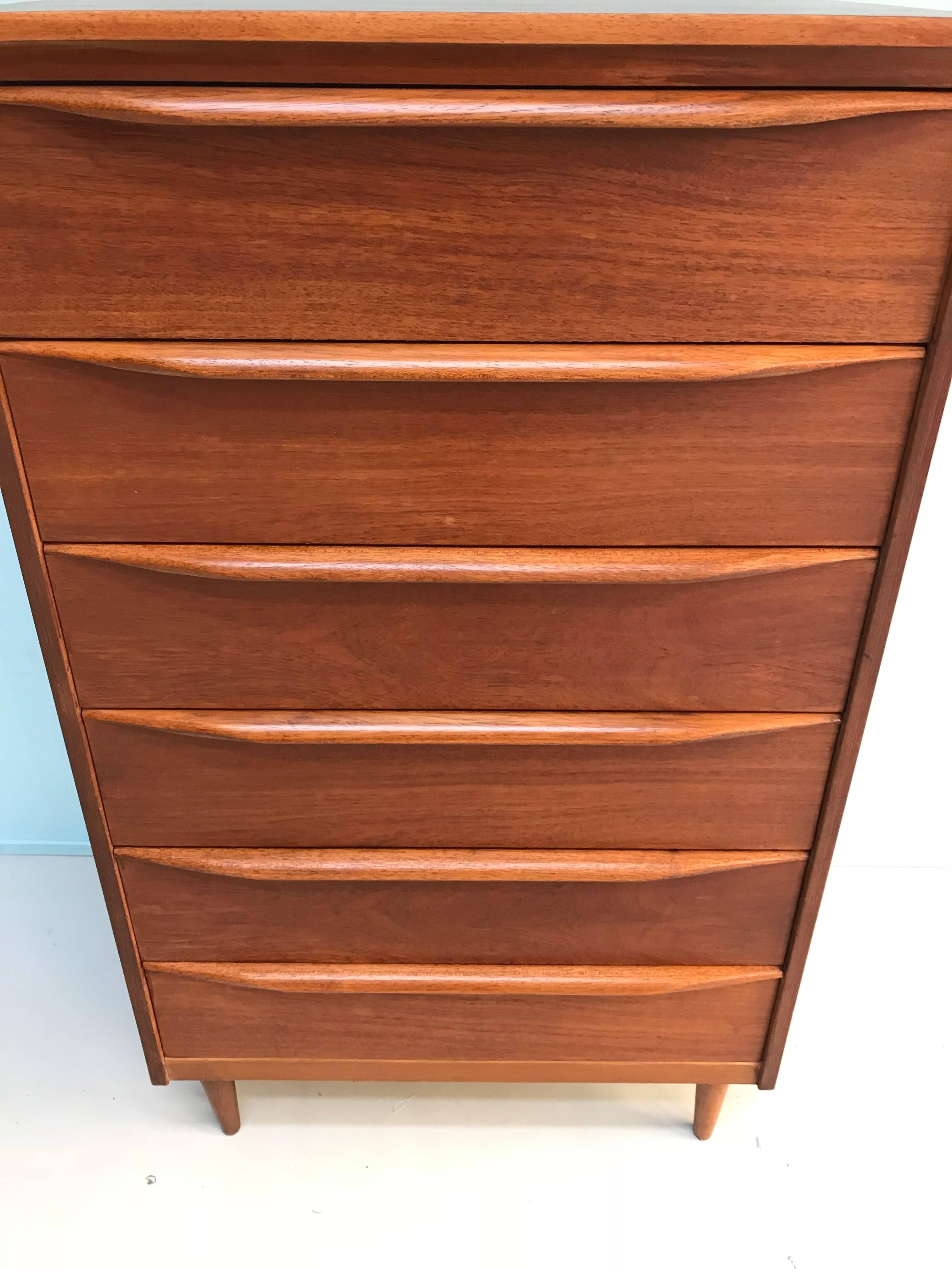 Stunning teak six-drawer enfilade by Austinsuite made in England design by Franck Guille in the 1960s.

Condition: very good
Measurements:
66 cm W/112 cm H/46 cm D

Itemnumber: 230.