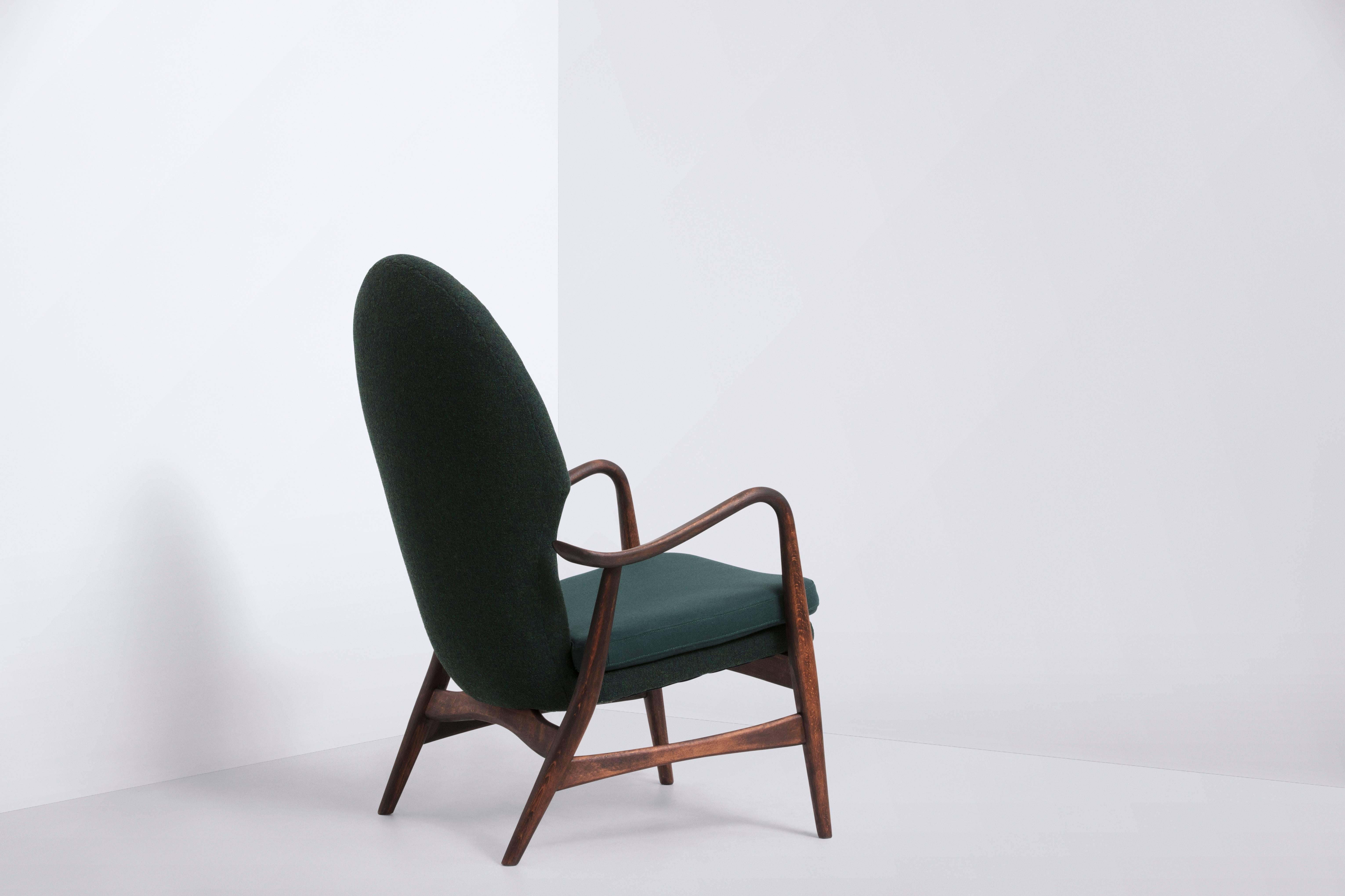 Produced by Slagelse Møbelværk
Frame of stained beech
Green wool upholstery by Kvadrat.
 
