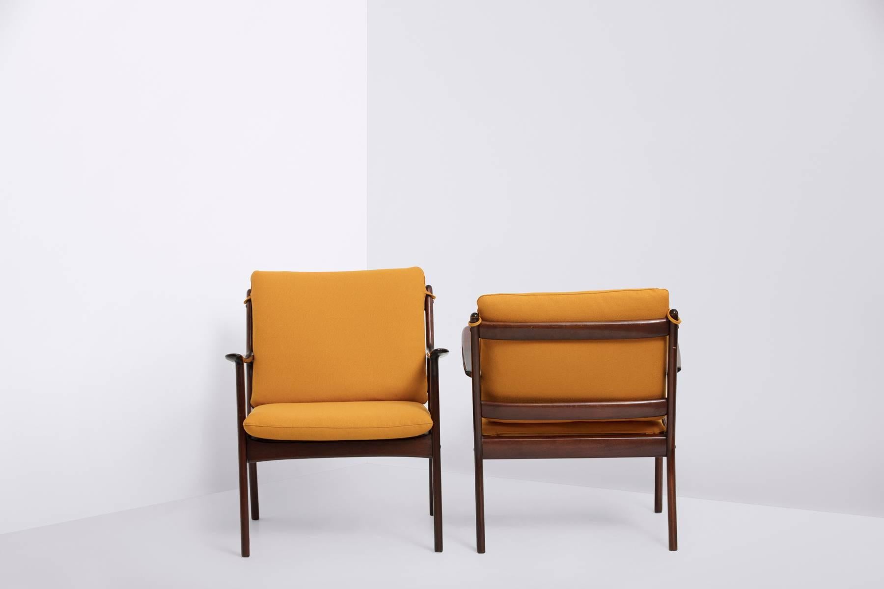 Produced by P. Jeppesen Møbelfabrik
Frame of solid mahogany
Yellow wool upholstery by Kvadrat.