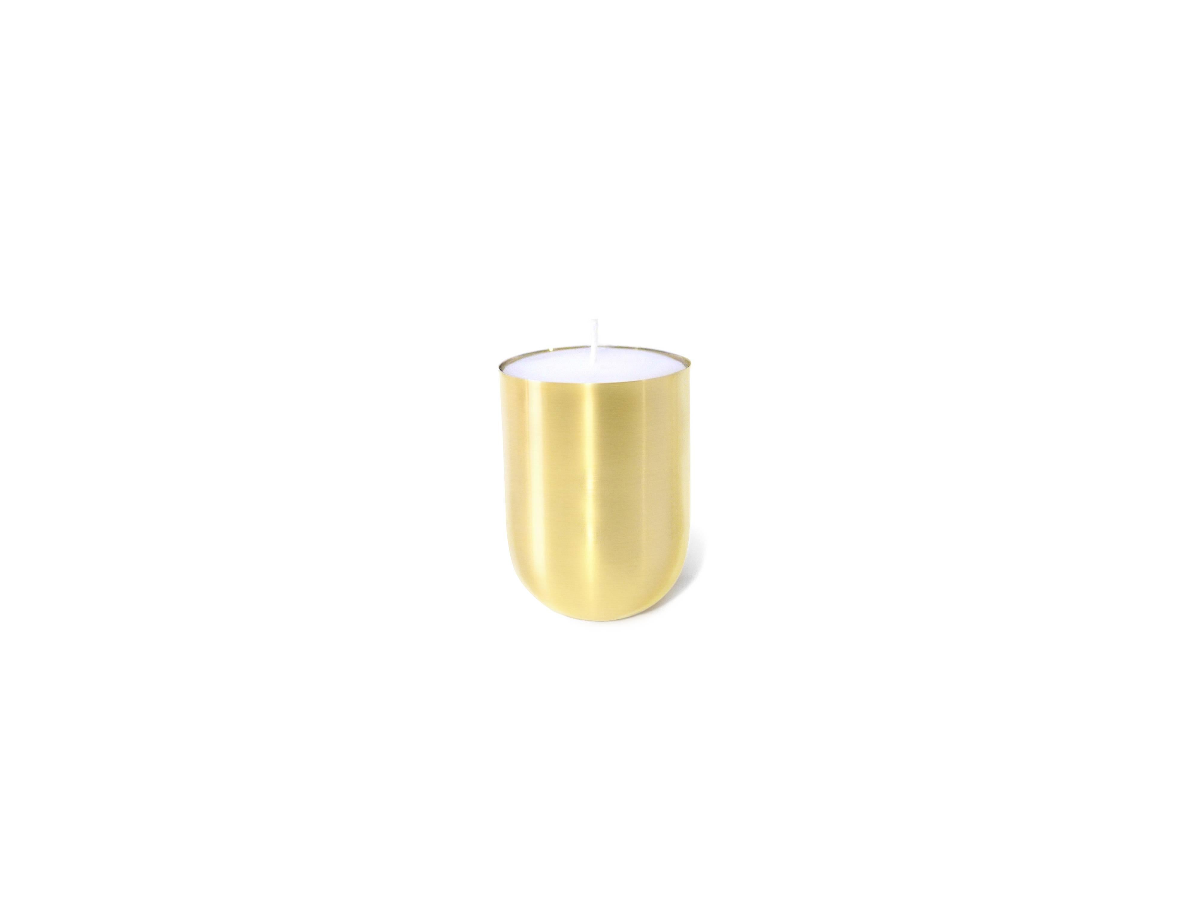Part of Les Few's Armance collection, this contemporary, round, handspun Swedish brass, modern, Minimalist candle is made by artisans in Sweden. The candle wax comes in either white or black. The brass is Swedish brass that is handspun to the shape
