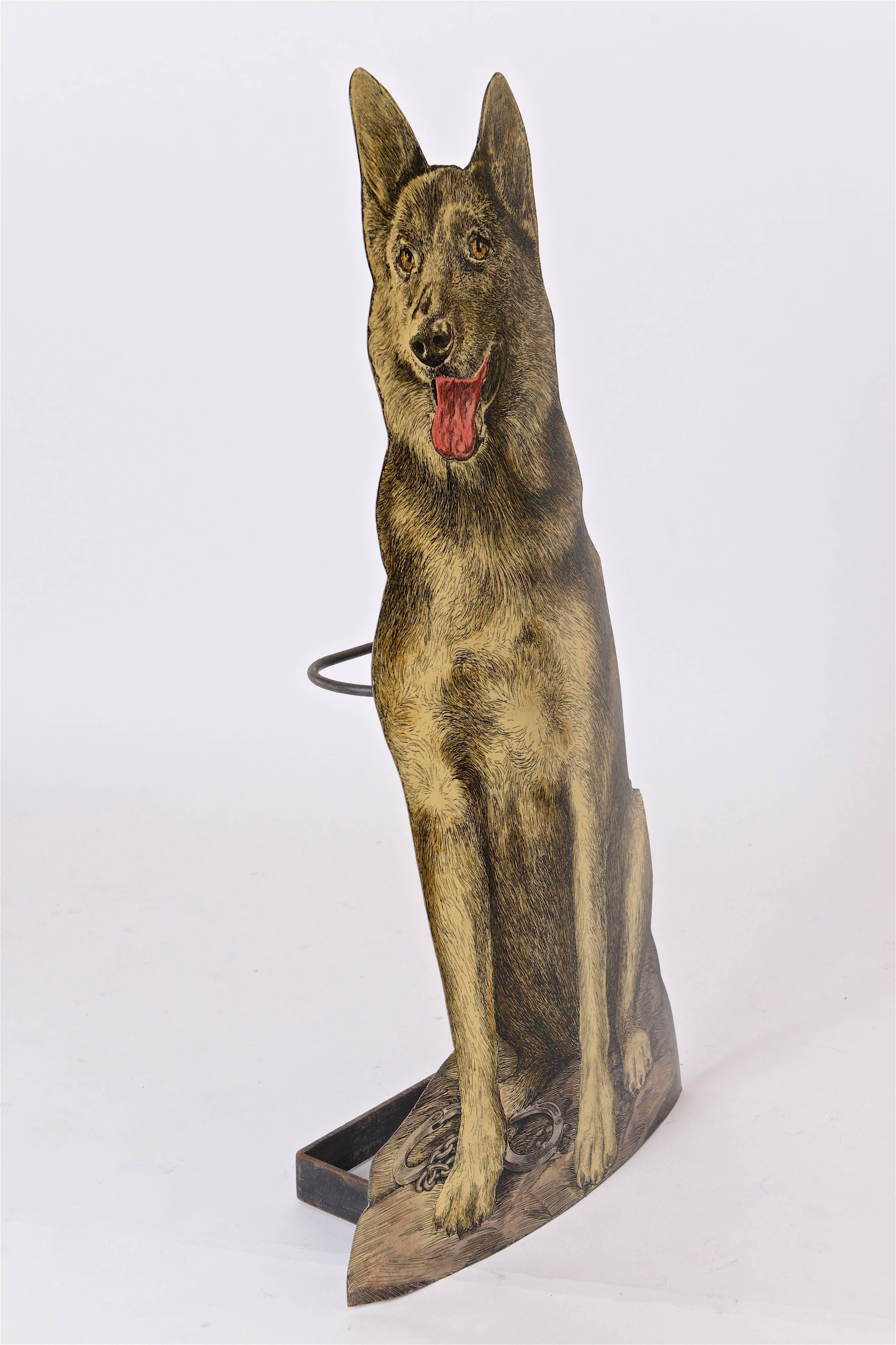A wonderfully fun umbrella stand by the creative designer, Piero Fornasetti. One of many dogs that Piero featured on his umbrella stands, this example portrays an Alsatian dog, most probably a police dog, due to the pair of handcuffs that feature in