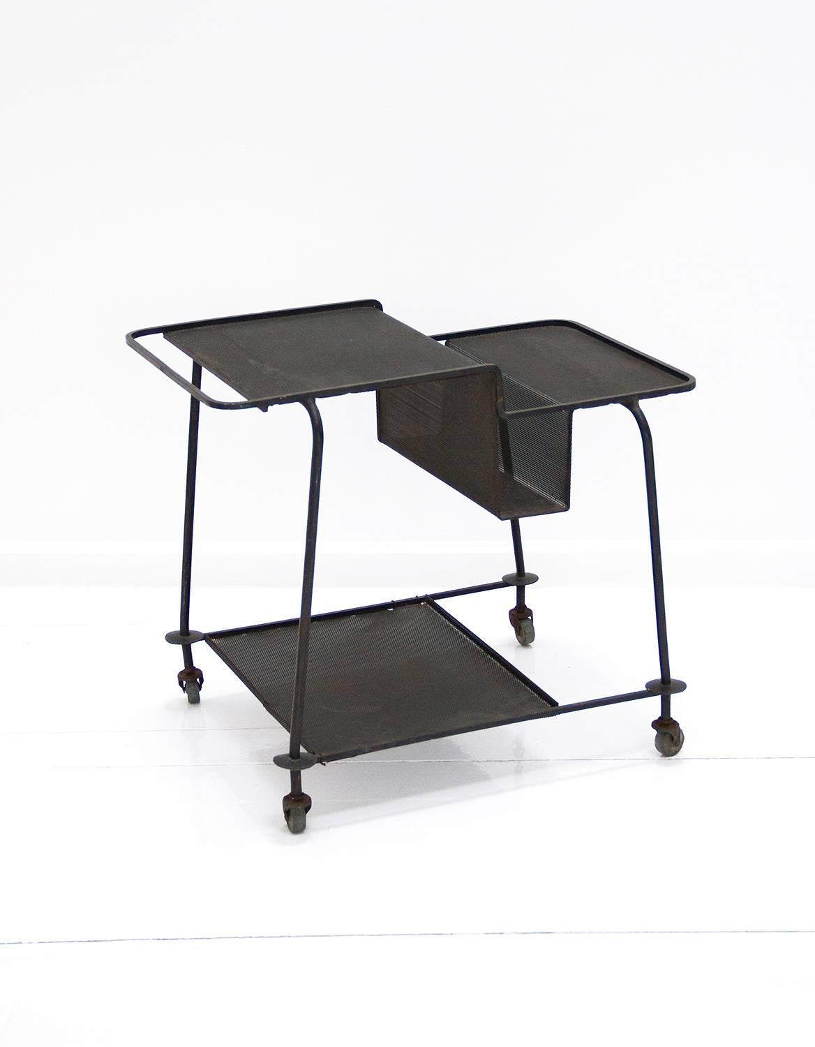 Original black serving cart designed by Mathieu Matégot. Made of lacquered iron. In good original condition preserving patina.
Manufactured in Ateliers Matégot, circa 1950, France.
 