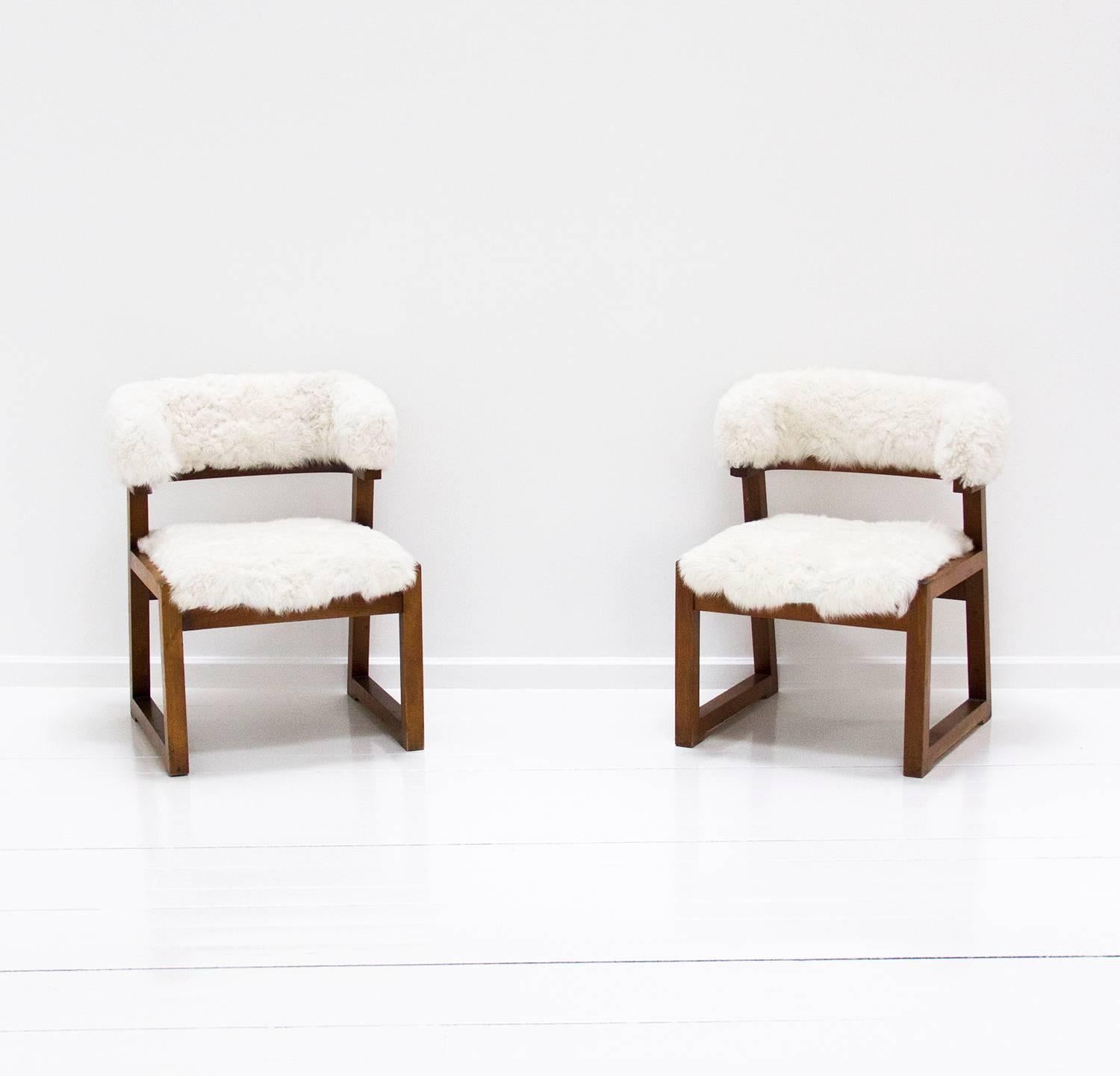 Set of four armchair designed by Juan Gamboa in 1968. Wood structure, seat and back upholstery recently with lambskin.
1968, Spain. 

 