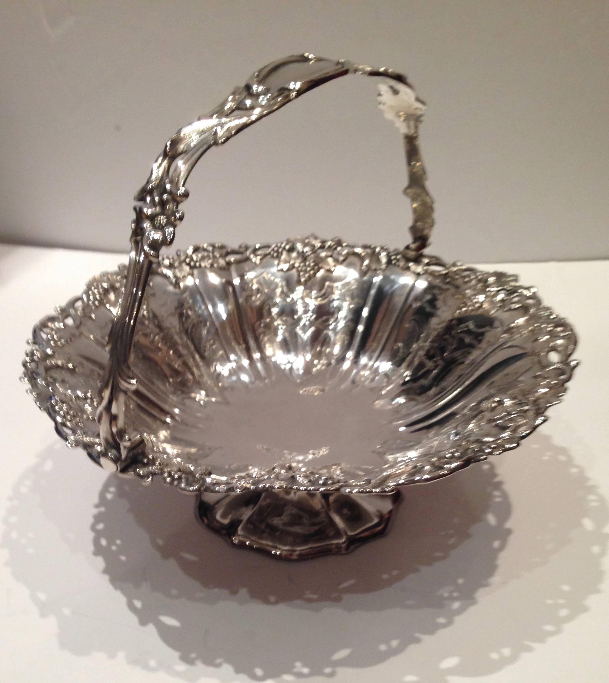 Solid silver basket with swing handle. Silversmiths John Roberts Sheffield, 1845. This finely made silver Basket was given to Sir Michael Costa by Queen Victoria. It is engraved around the base. The gift of the Queen to Sir Michael Costa. Sir