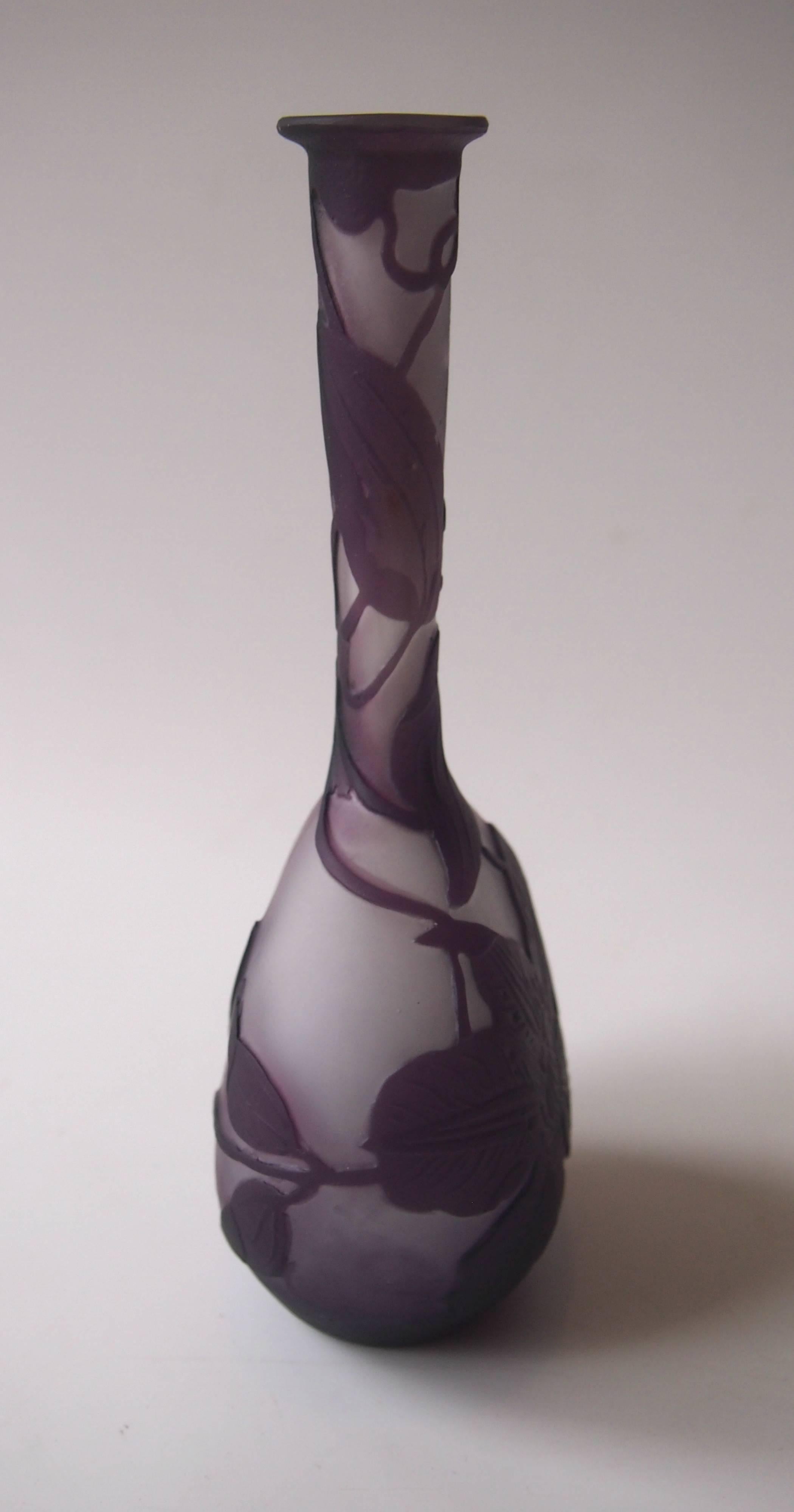 Classic Art Nouveau Emile Galle 'Banjo' vase, depicting trailing clematis blooms in purple over frosted clear, signed in cameo (see picture 4). Emile Galle Cameo Banjo vases (so called because they vaguely resemble that shape) are amongst the most