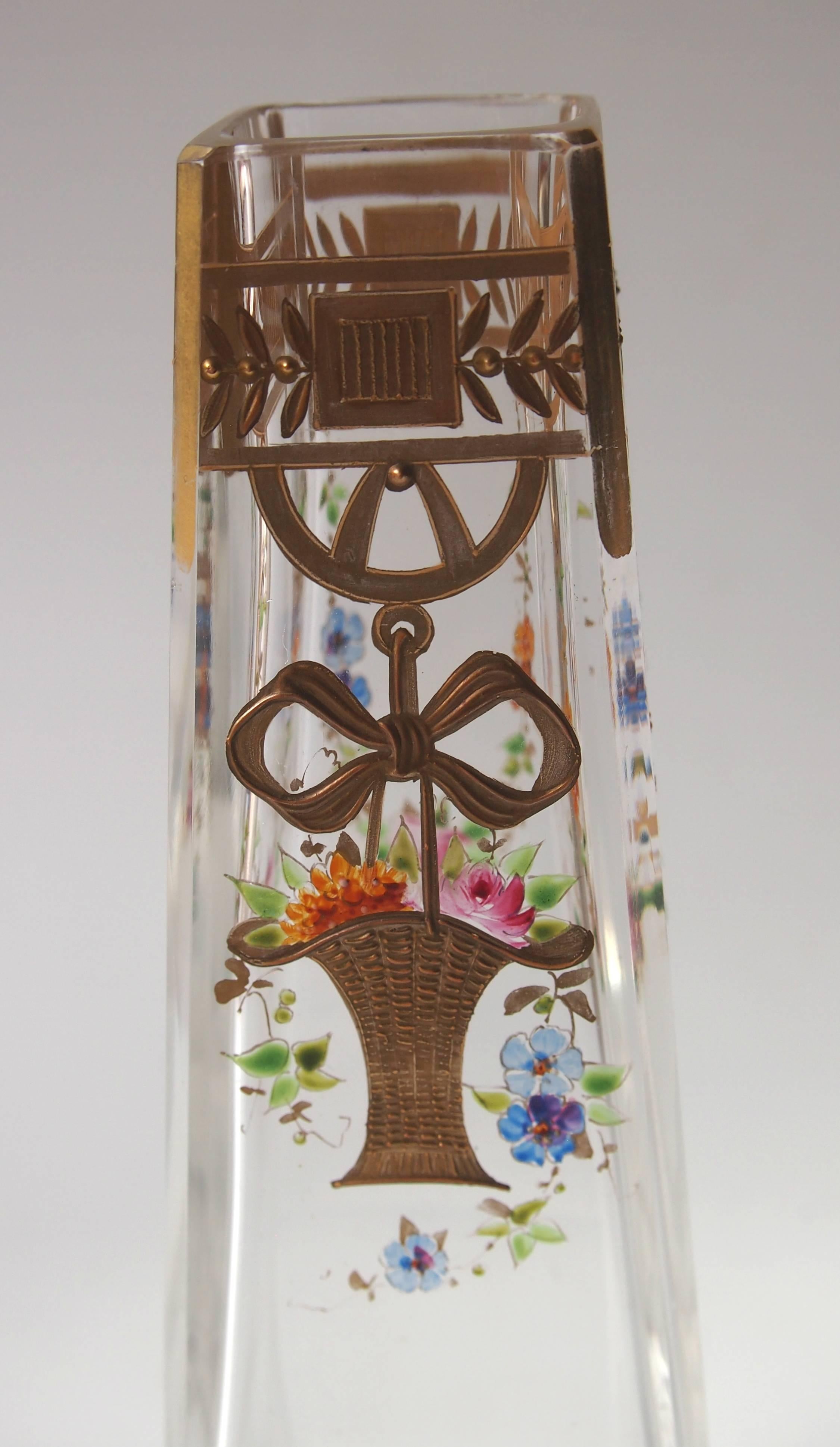 Super late Victorian Harrach clear cut, polychrome enameled and gilded vase depicting a basket of blooms suspended from a bow. Unusually the original design is recorded in the Harrach design books (see last picture).

Harrach has been the backbone