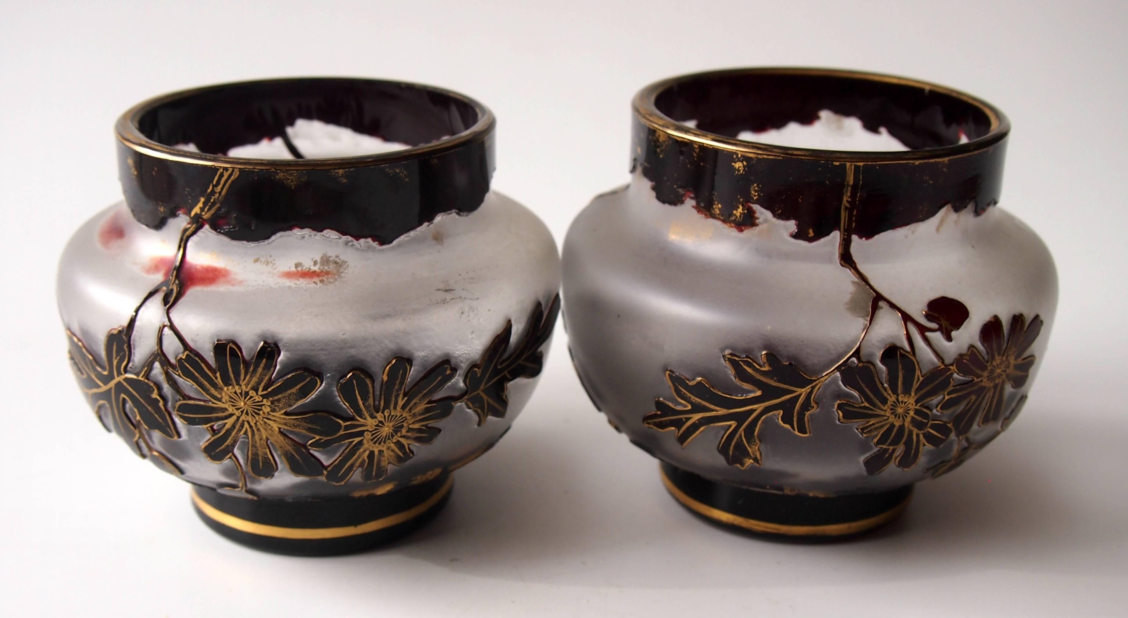 Super true pair of Harrach gilded dark red on clear cameo vases, depicting blooming branches. These are a very dramatic red -almost black over clear with thin red highlights. Bohemian cameos are sadly neglected and Harrach was one of the earliest