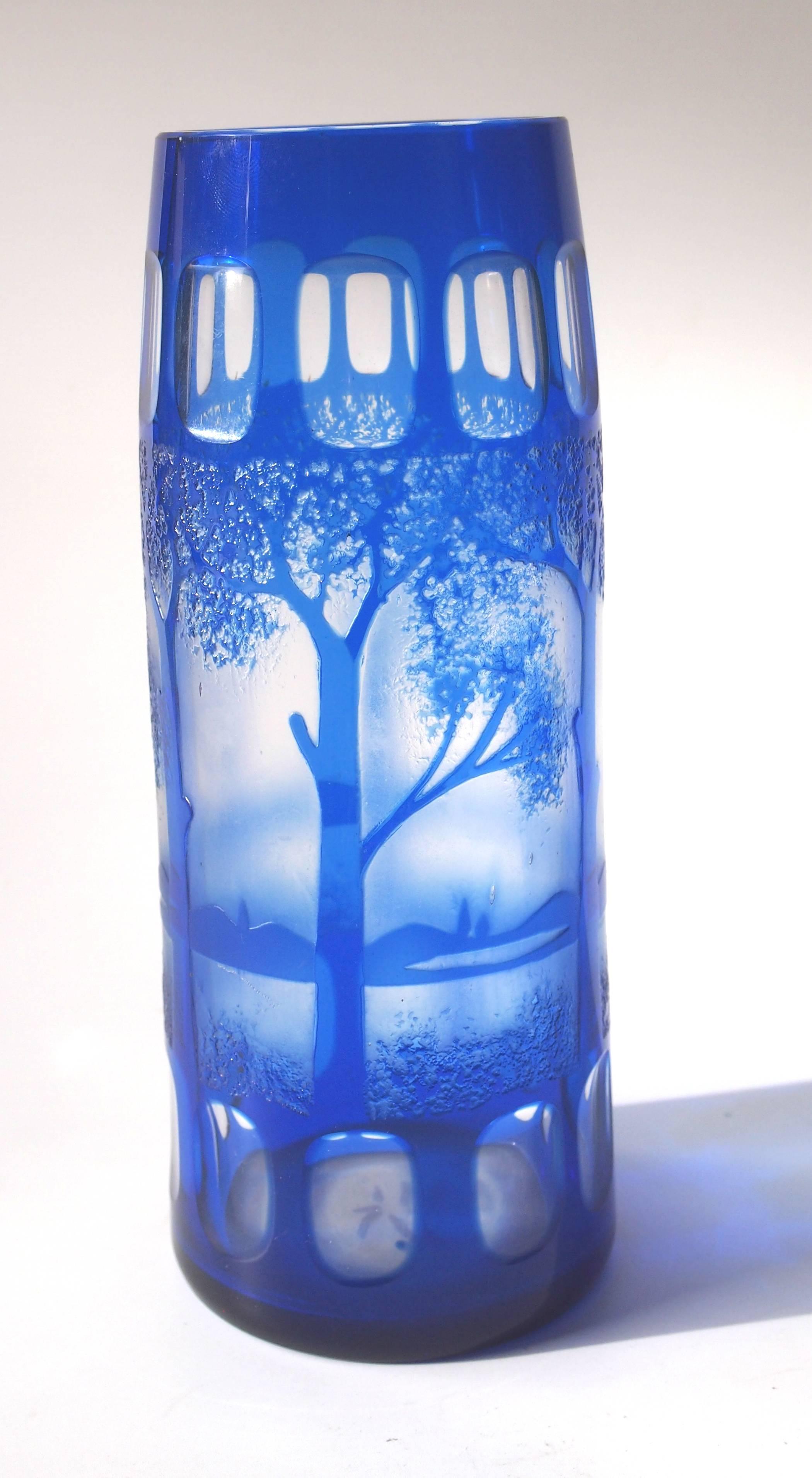Superb bright blue on clear Kralik Art Deco cameo landscape vase. Depicting a repeating pattern of trees, a lake and a far shore. These vases were made in a variety of sizes and colours. Very few Kralik designs are know, but this appears on one of
