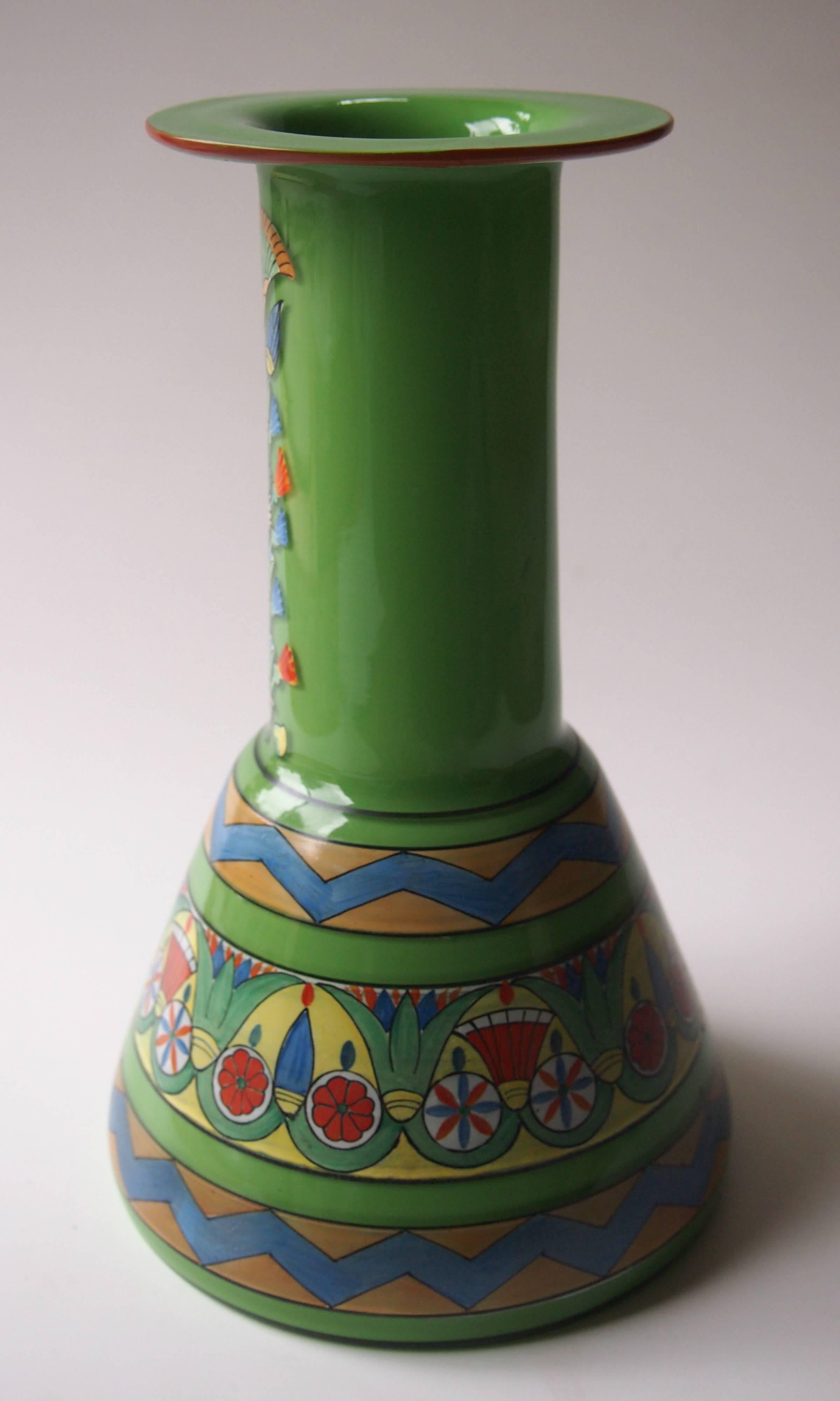 A super early Art Deco enameled moser Egyptian/Tutankhamun style green cased vase -decorated with a variety of Egyptian imagery -papyrus, lotus flowers etc. This would have almost certainly been produced after the announcement of the opening of
