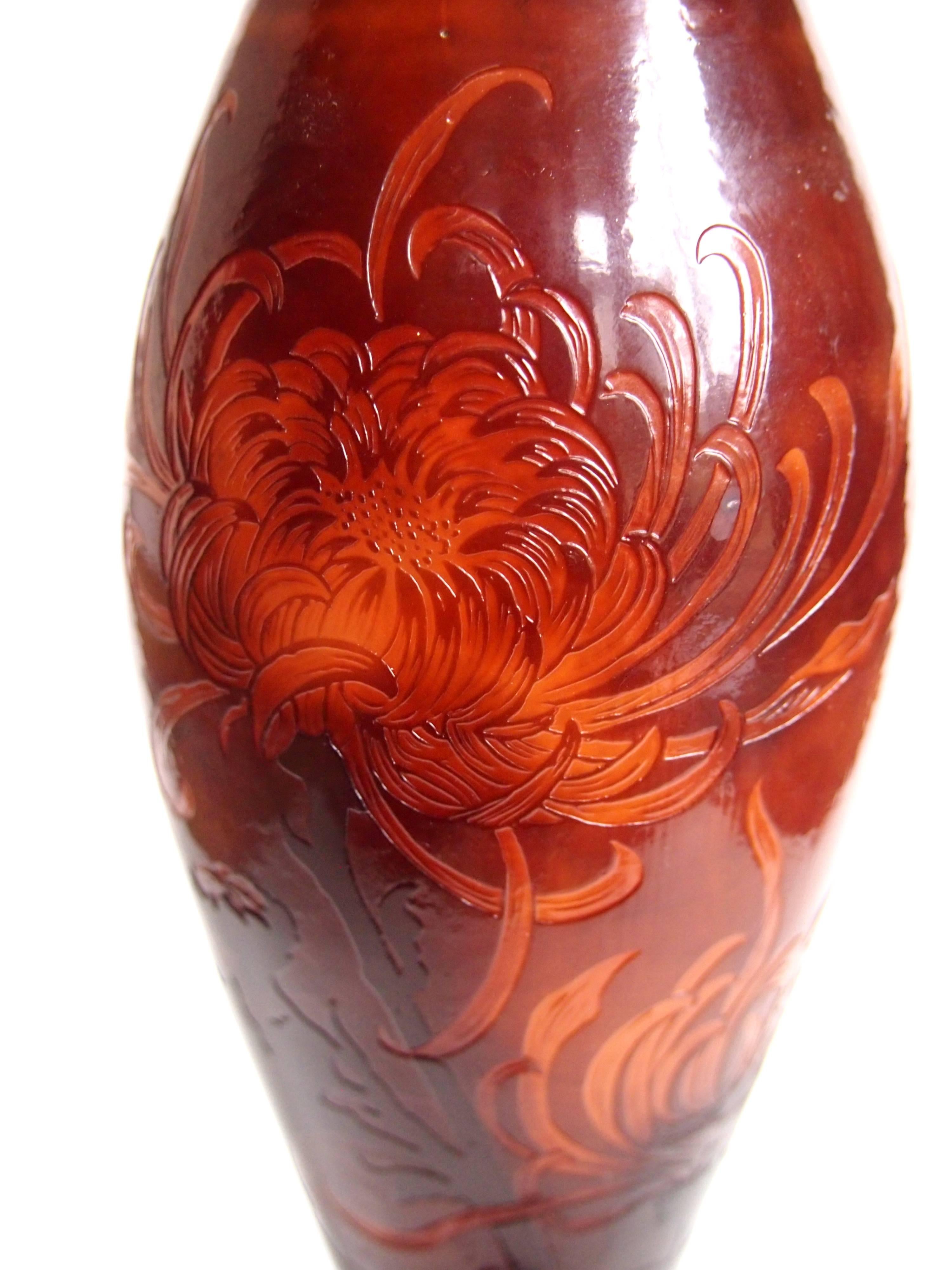 A very rare Emile Galle cameo vase in brown over green/yellow possibly an experimental piece. Usually with cameo the image is created by removing the surrounding glass with acid, but with this vase the acid has been used to intaglio cut a beautiful