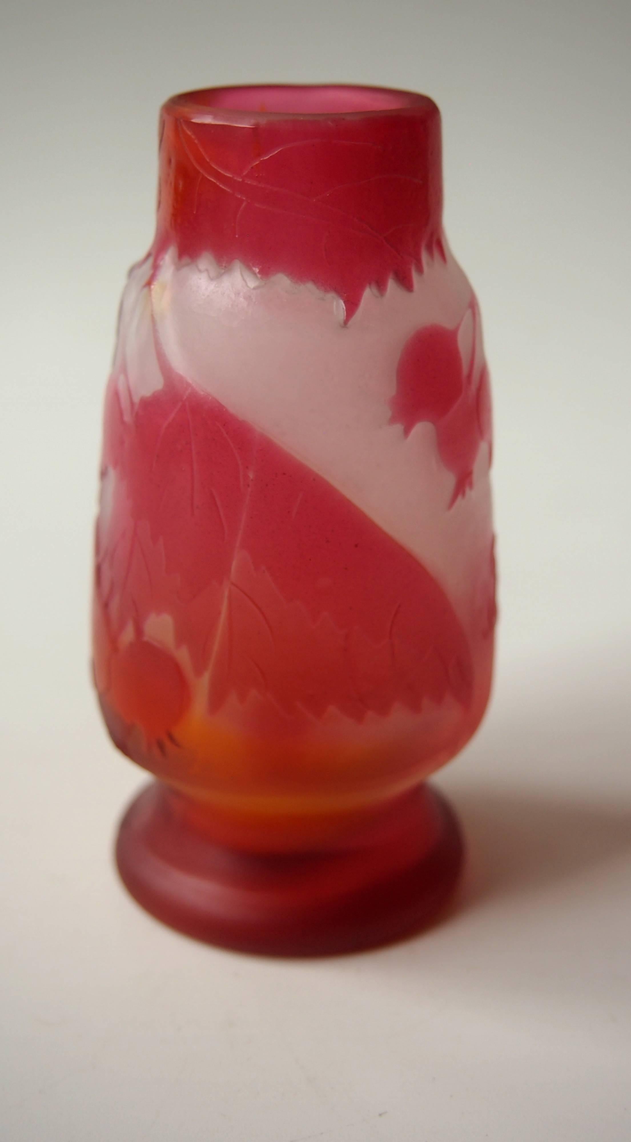 Very pretty classic French Art Nouveau, near miniature, Emile Galle cameo vase in red and orange depicting branches with foliage and berries -a Classic image and shape. Signed in cameo (image3)

Emile Galle was probably the greatest glass maker of