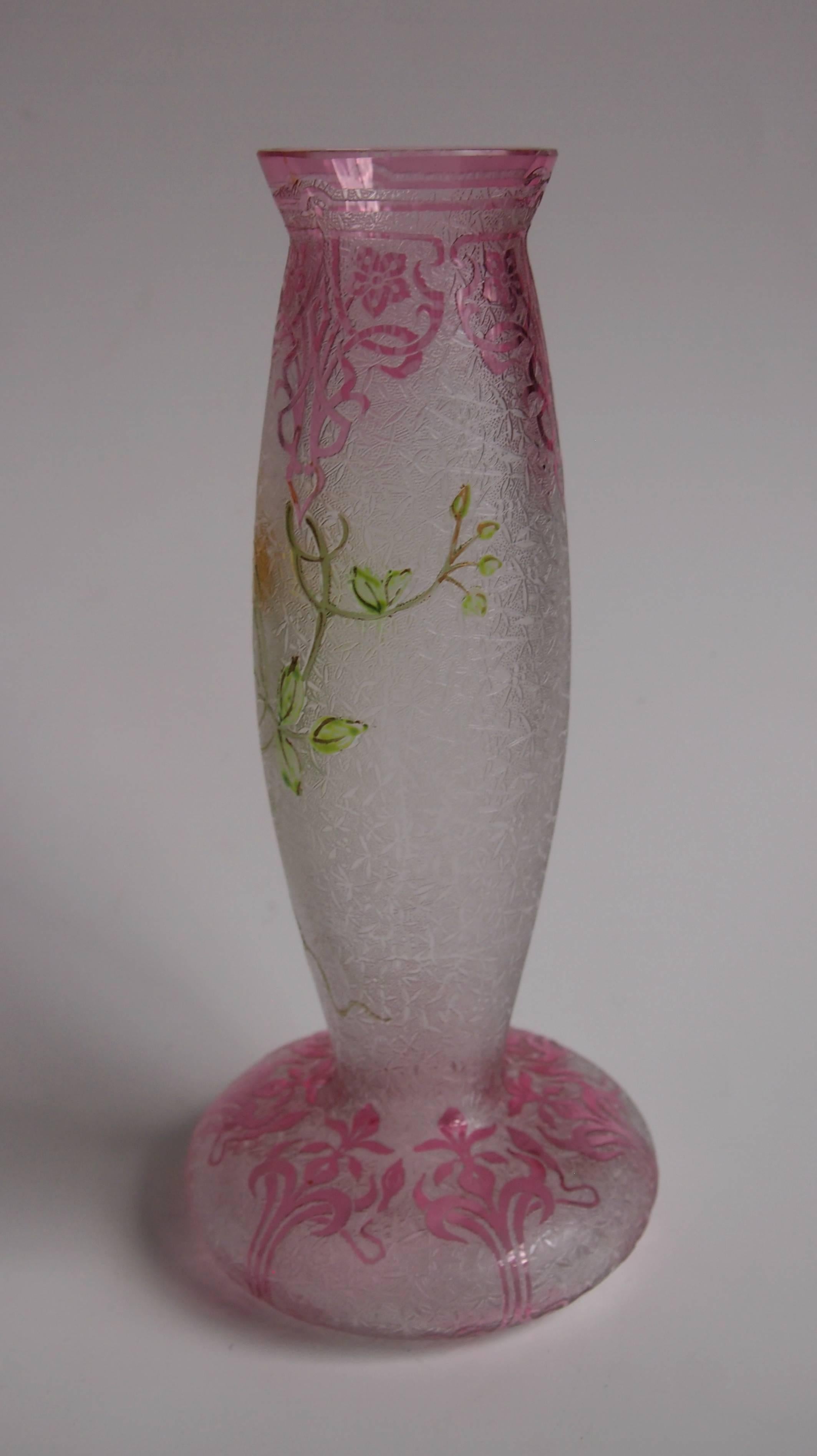 Very unusual Art Nouveau Baccarat crystal cameo vase in red over clear with enameled flowers and leaves in greens and yellow (with red and brown highlights). As with most early Baccarat cameo there is a fine pattern detailed in the clear layer -this