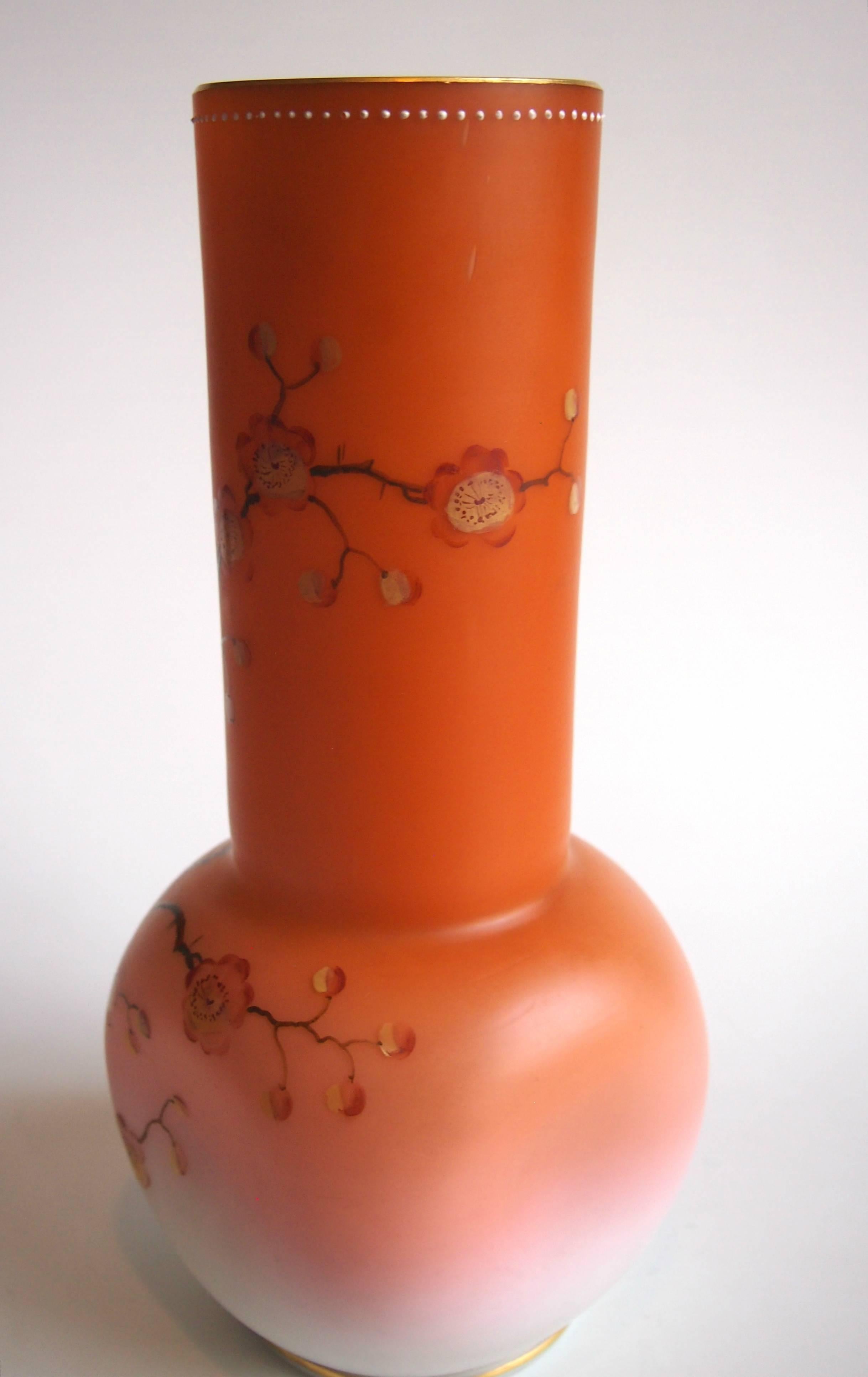 Rare late Victorian enameled and gilded Loetz vase, peach shading to creamy white, decorated with flowering peach blossom. Circular turning to square form and returning to circular. Made just before Loetz became famous for iridised glass.