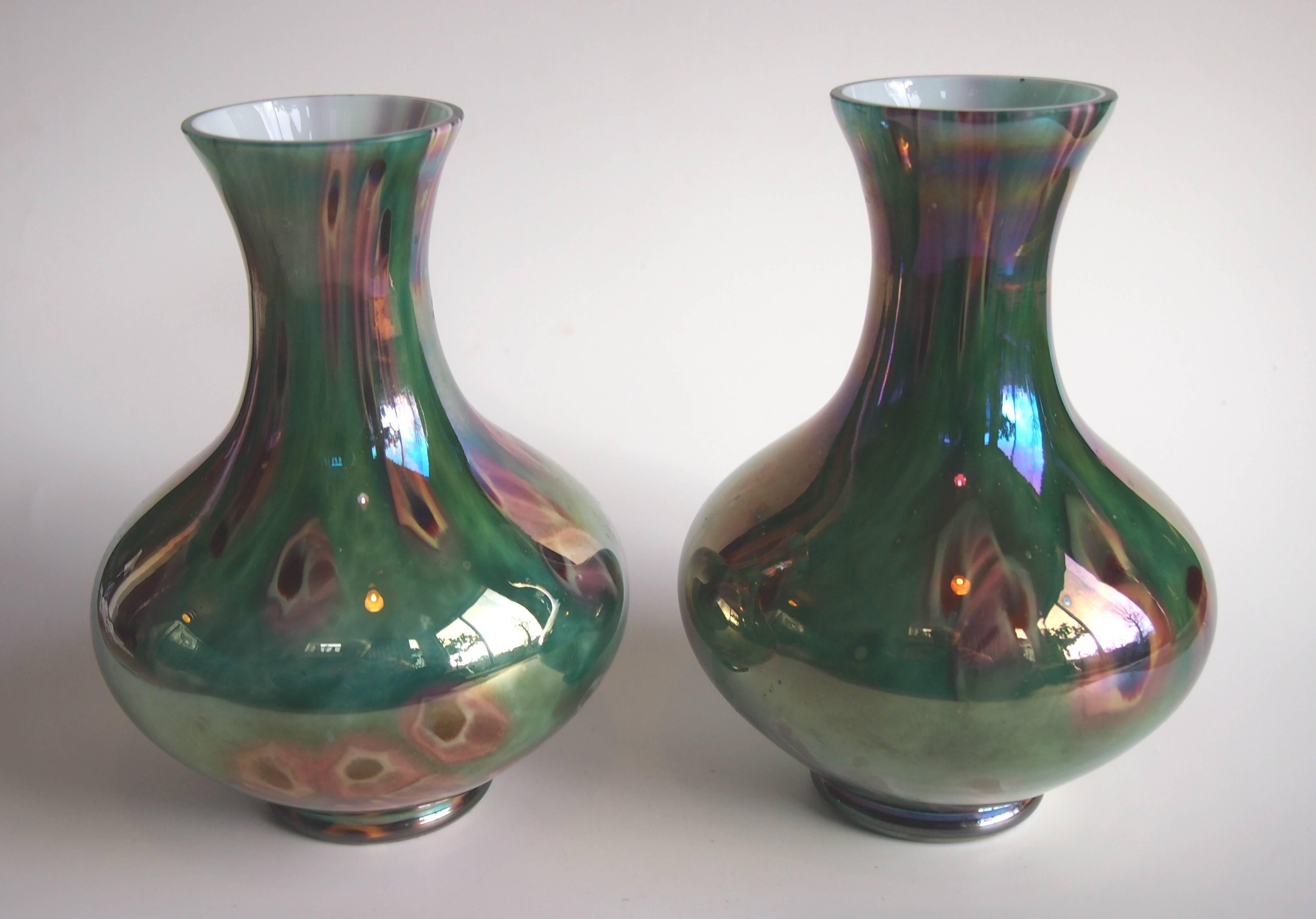 Super pair of Kralik Art Deco cased iridised 'paperweight' vases. These are made by using cut paperweight canes that are applied to the surface of the vase before it is blown, so that in the finished blown pieces the cane segments appear large. The