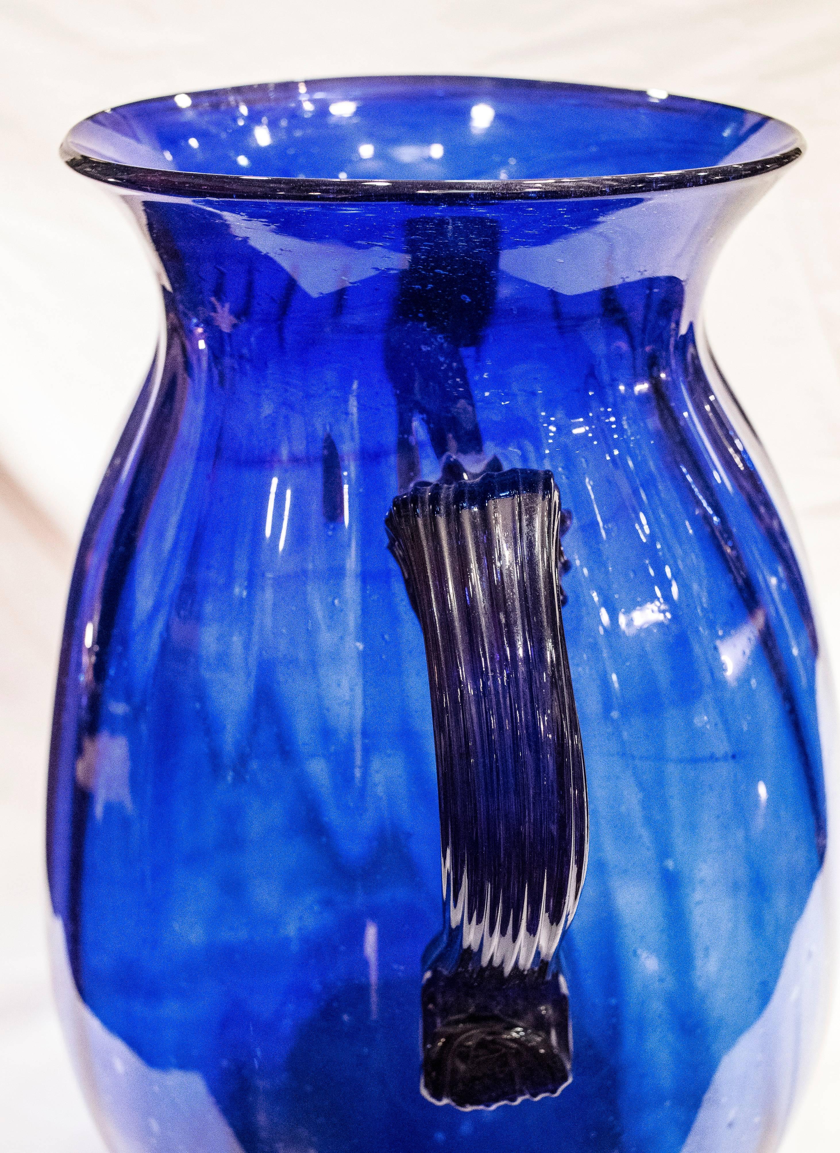 A pair of Murano crystal vases from the 19th century. Blown glass in blue, both are in a very good condition.