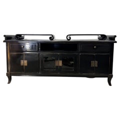 Oriental sideboard cabinet, lacquered wood with woodblock-style engraved pulls