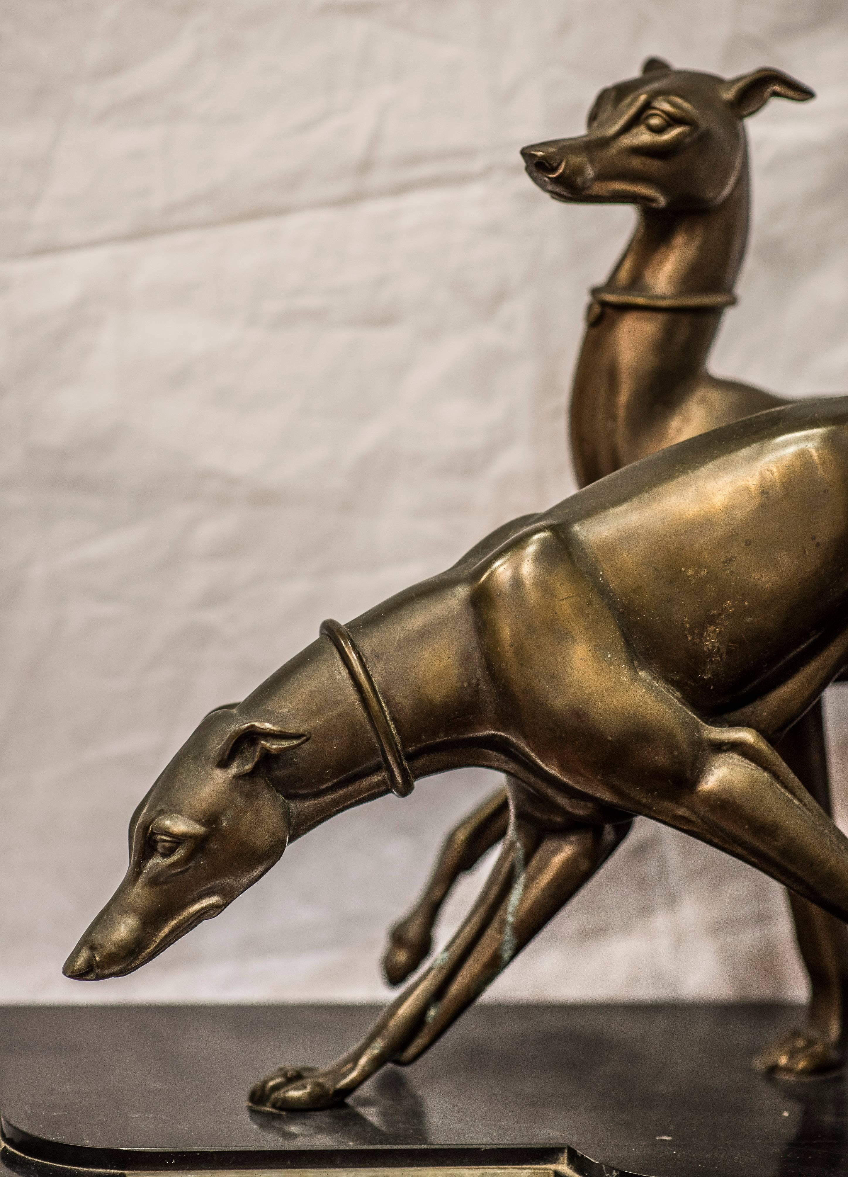 An impressive greyhounds sculpture by Irénée Rochard (1906-1984). Granite and marble based. Sign.