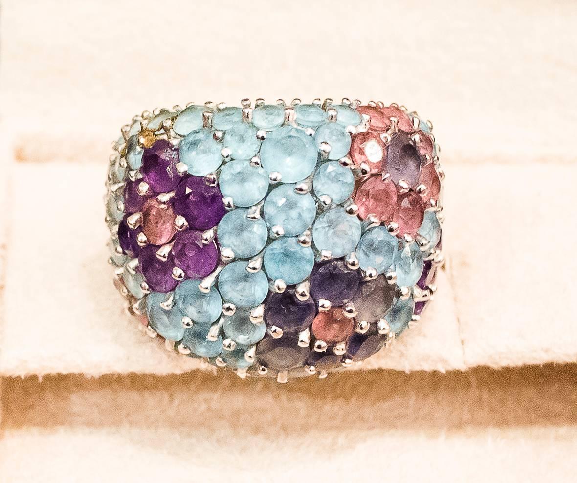 An exquisite black gold ring with a pave of precious stones, amethyst, aquamarine, rose of France, turmaline. Italian jewelry, from Suarez Jewelry, 1934, Spain. In a perfect condition. Signed  PASQUALE BRUNI