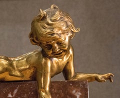 19th Century Marble Base Ormolu French Sculpture of a Boy Lying Down
