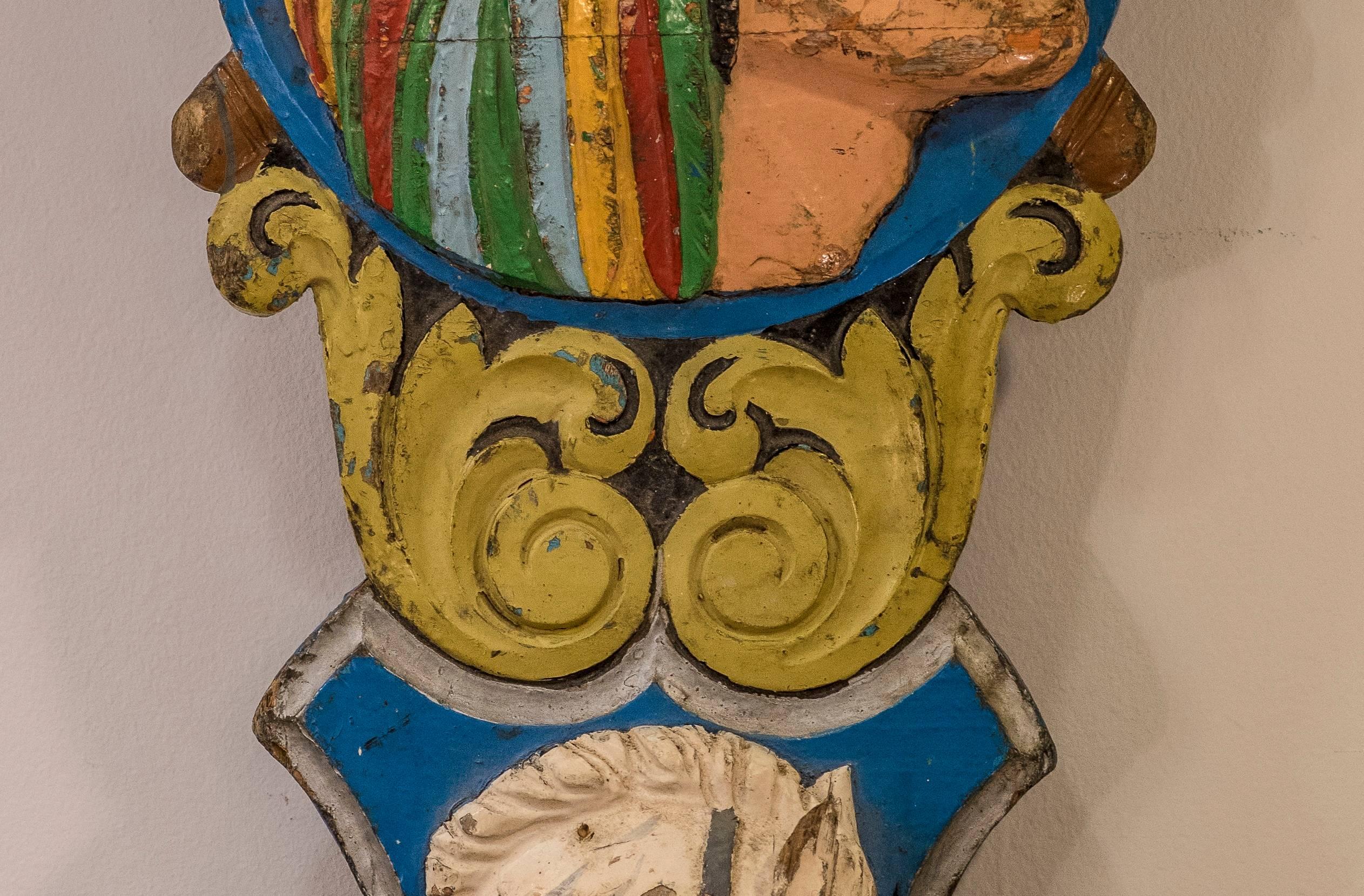 An amazing part of a French carousel, 19th century, circa 1890, in a hand painted and carved wood, with a horse and an a American Indian in blue and other colors. In a good condition.