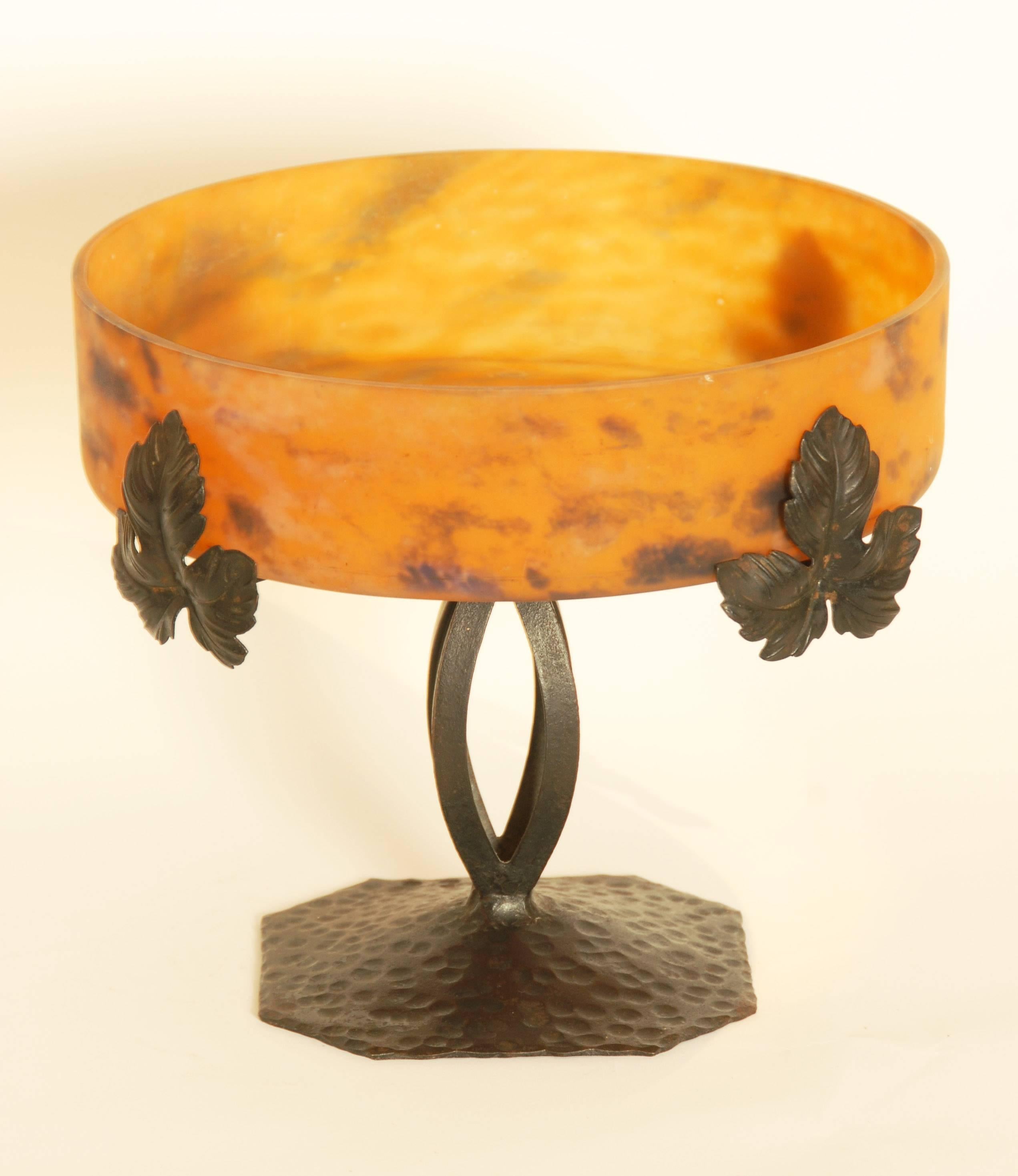 Art Deco Pate de Vere glass dish on black metal stand.
The glass is indistinctly signed.