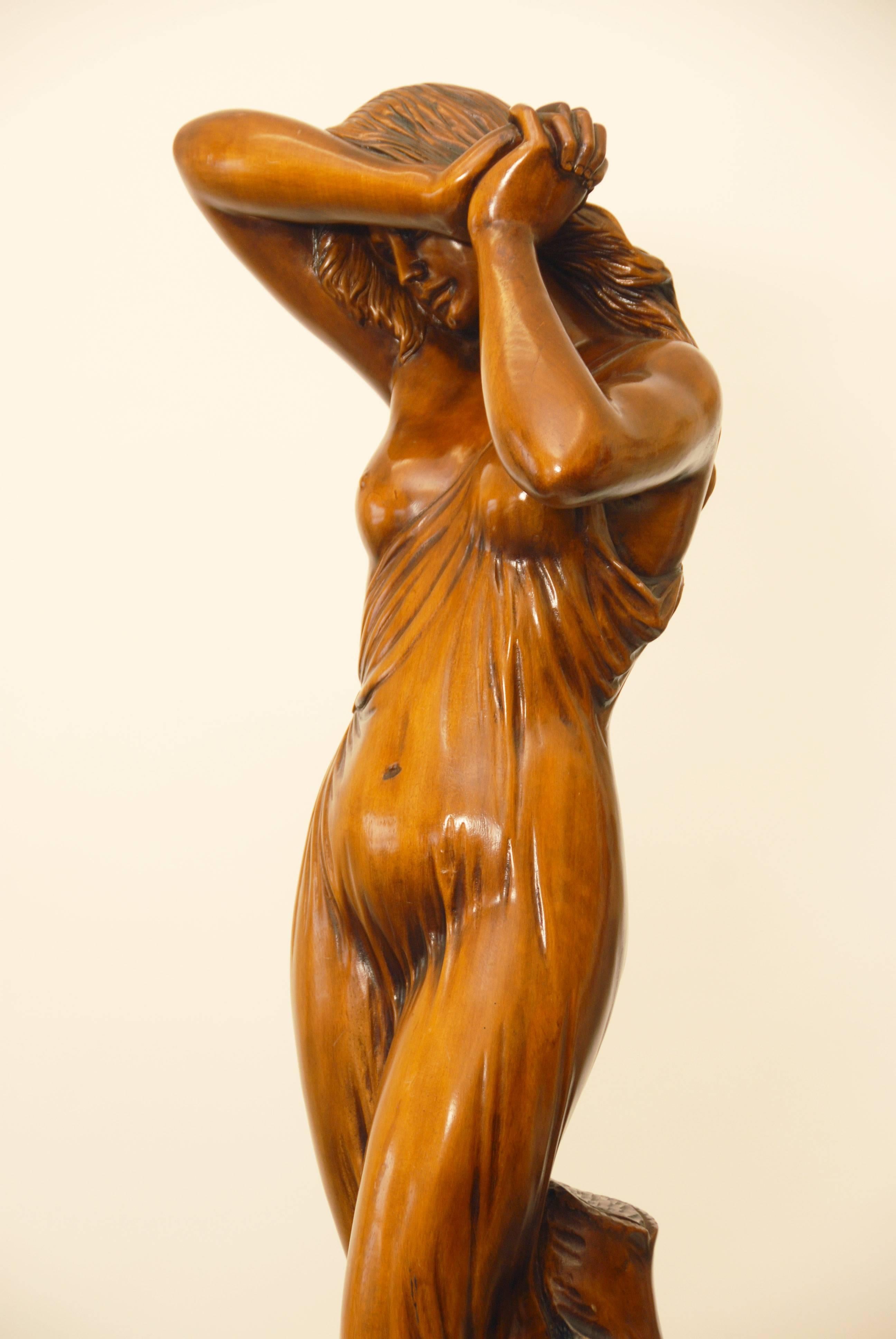 A very beautiful and sensuous sculpture in wood that is an impressive 63.5 inches high with a weight of about 25 kg or 55 lbs.