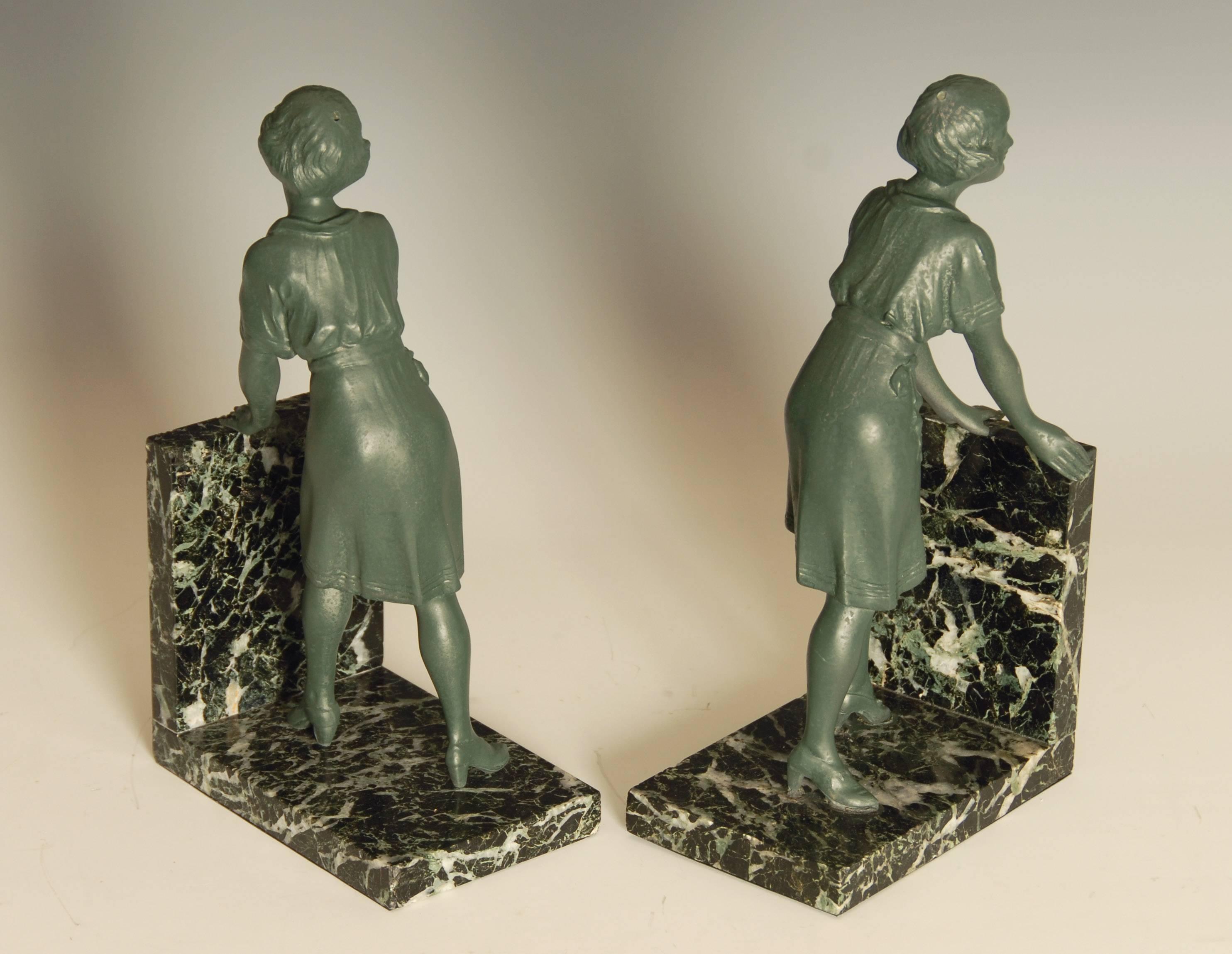 Pair of Art Deco Green Patinated Metal on Marble Bookends In Good Condition In Brighton, GB