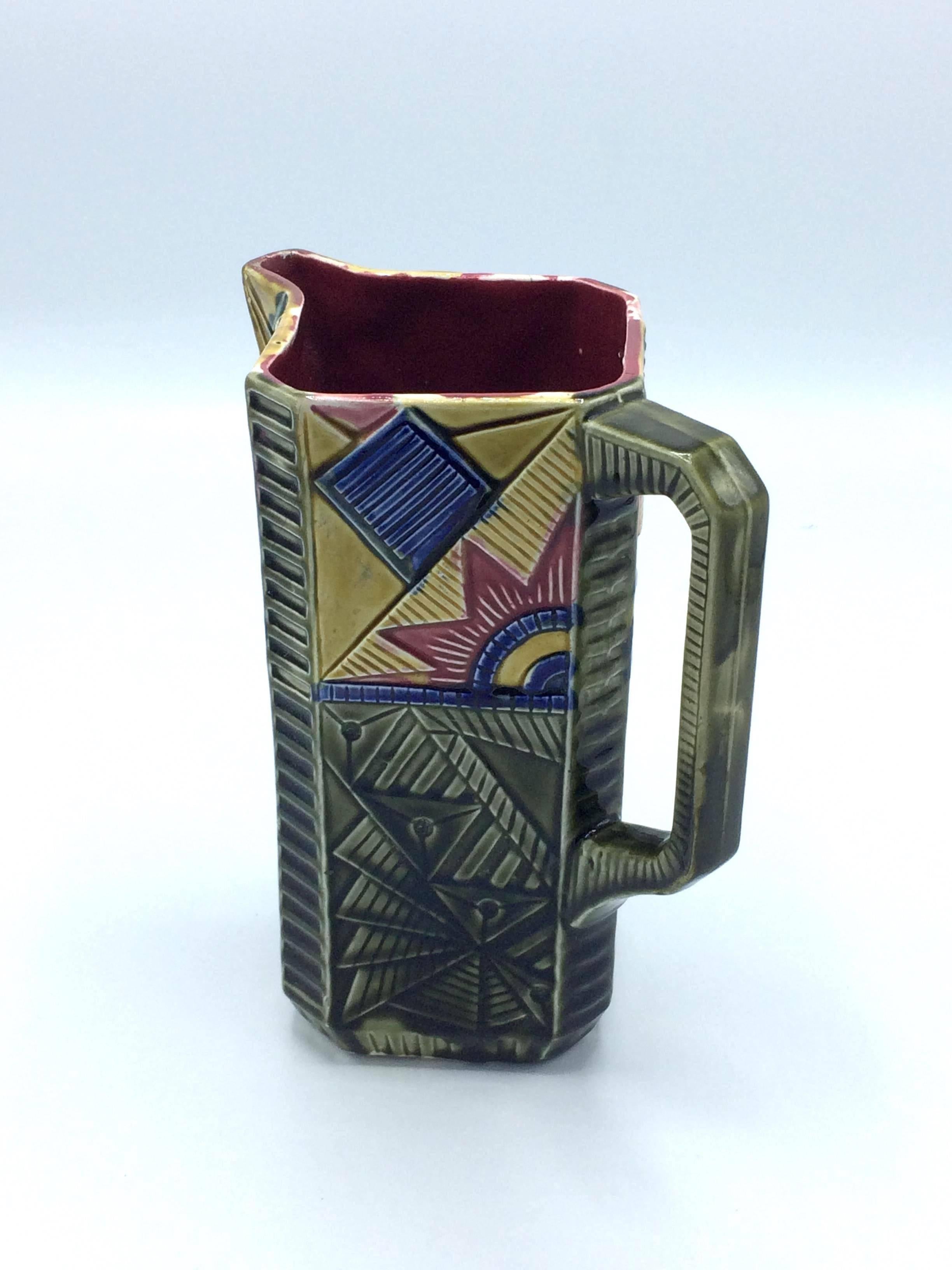 Amazing Majolica Art Deco pitcher by Onnaing.
Signed on the bottom.