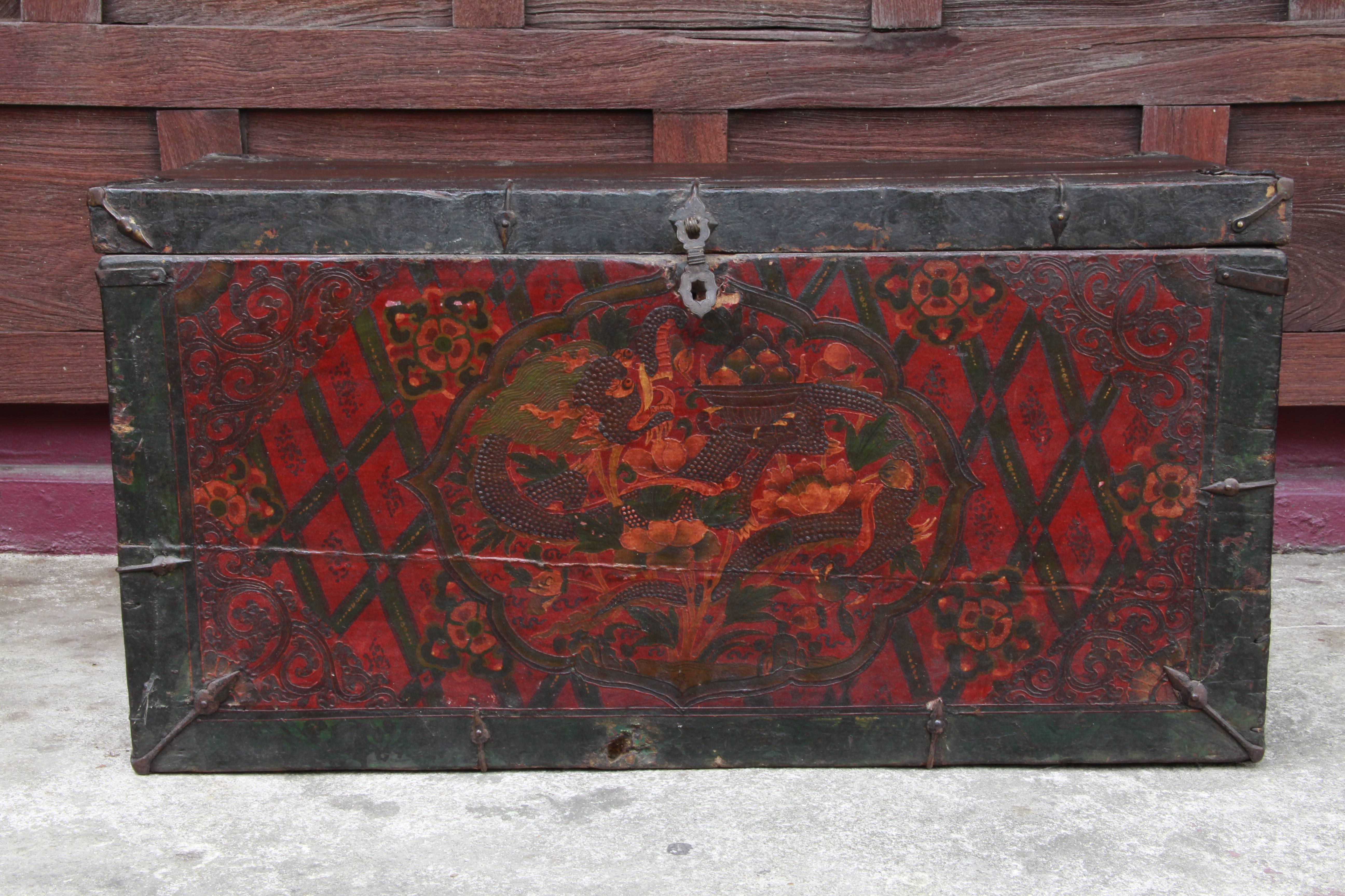 Covered storage boxes are among the earliest examples of surviving Tibetan furniture produced from the 16th-18th centuries (by the 19th century they were being supplanted by the cabinet). The box or trunk is decorated with raised gesso on the front.