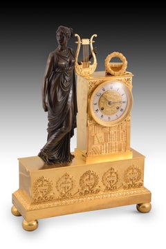 Table clock with Muse and writers. Bronze, Paris movement. France, 19th century.