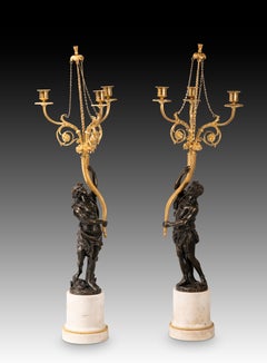 Pair of candlesticks. Marble, gilt and patinated bronze. AFter Clodion, 19th c.