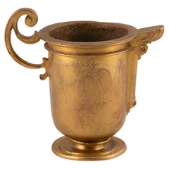 Spouted jug-type cruet. Gilt bronze. Spanish school, 17th century.