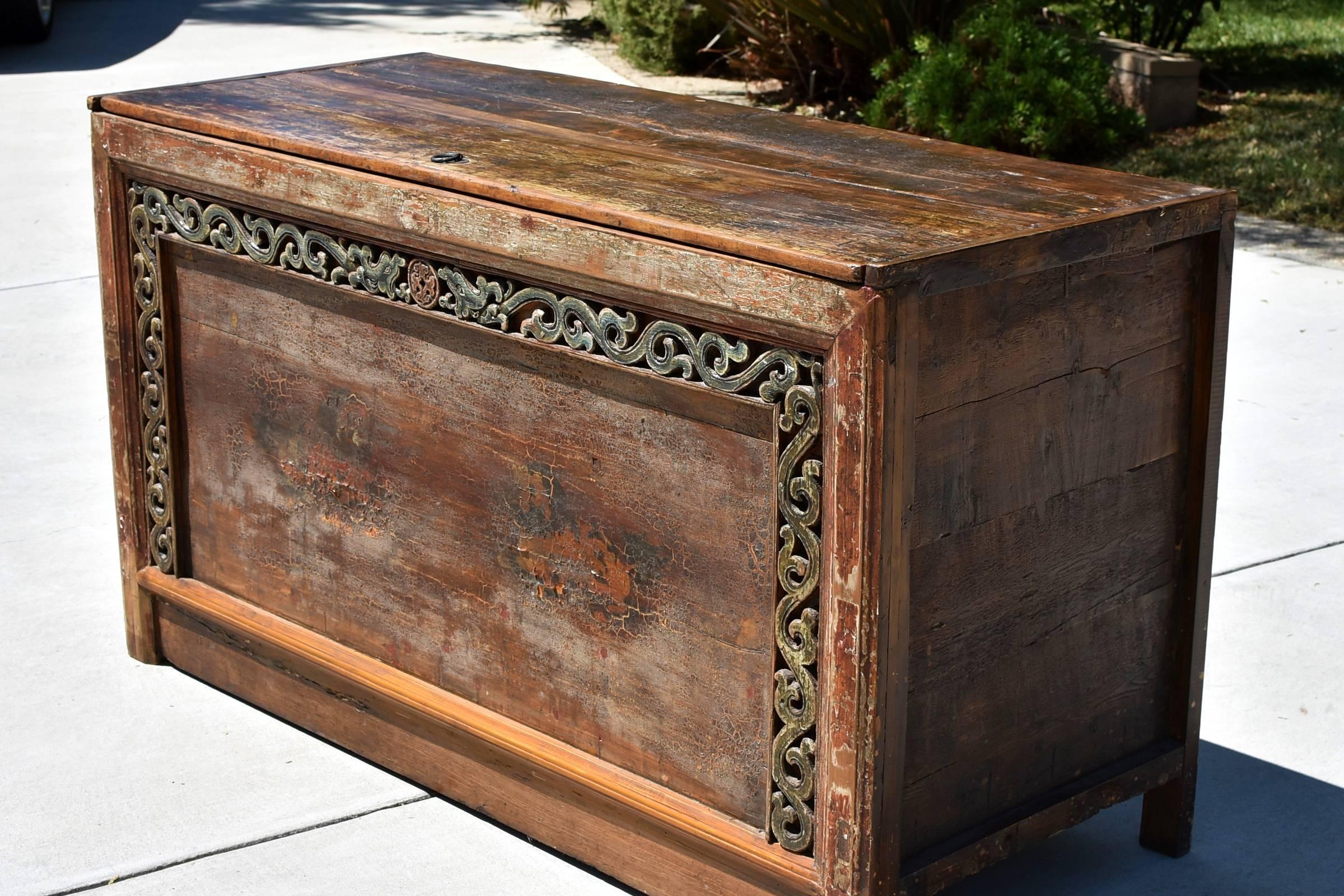 Hand-Carved Original Early 19th Century Mongolian Chest with Painted Foo Dogs For Sale