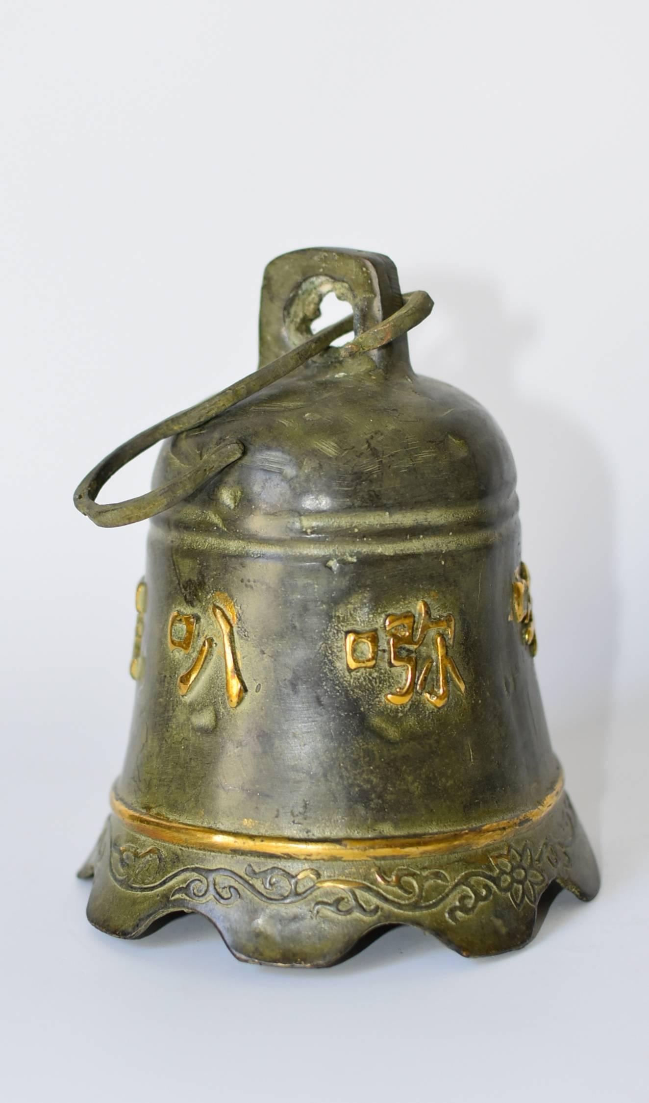 Beautiful temple bells engraved with the Buddhist chanting of 