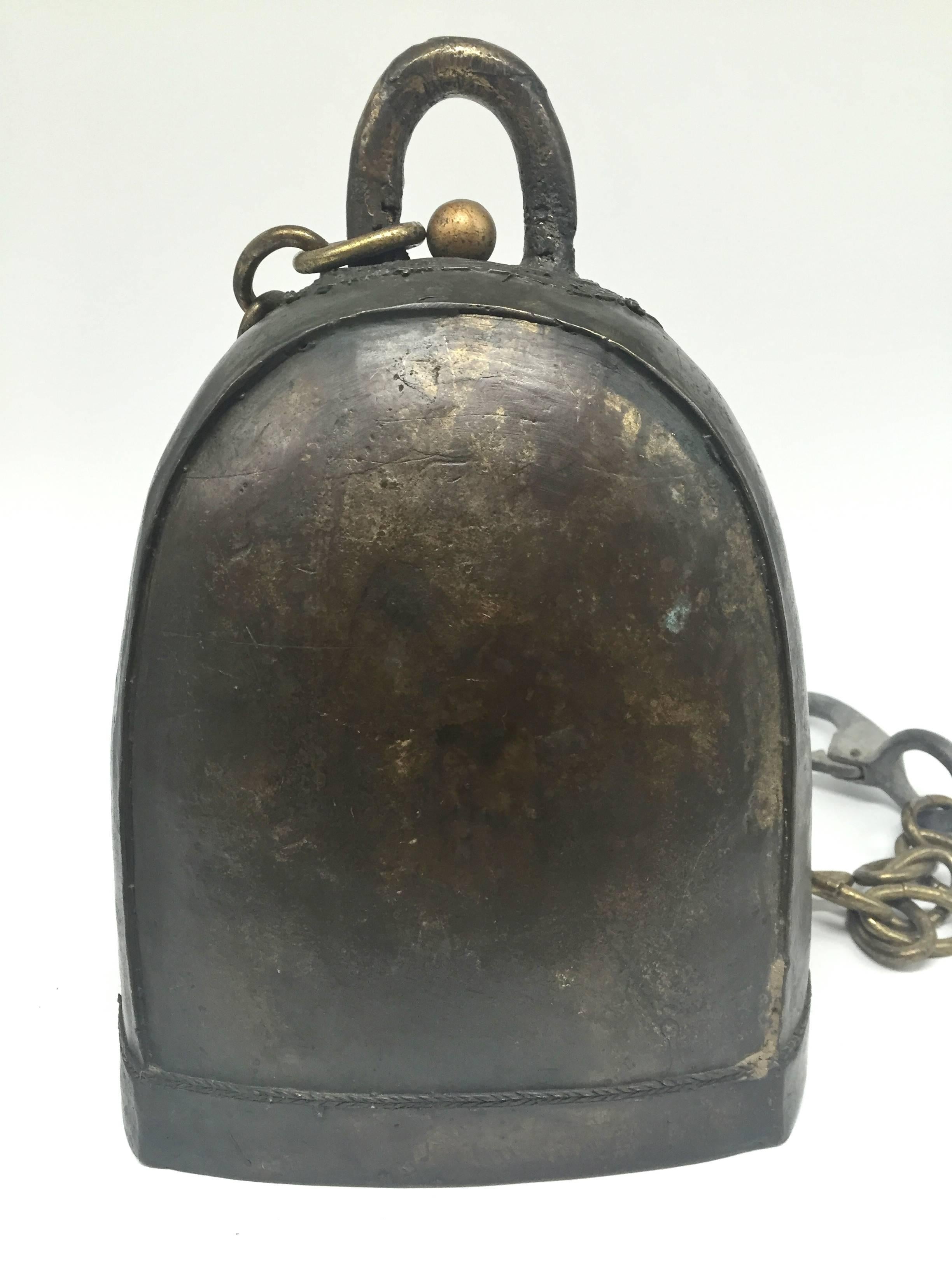 This is a substantial yet beautifully crafted antique temple bell. Solid bronze and wonderful design creates a lasting, powerful sound that is pleasant and thought provoking. Bell is an important part of Tibetan daily life. It acts as an