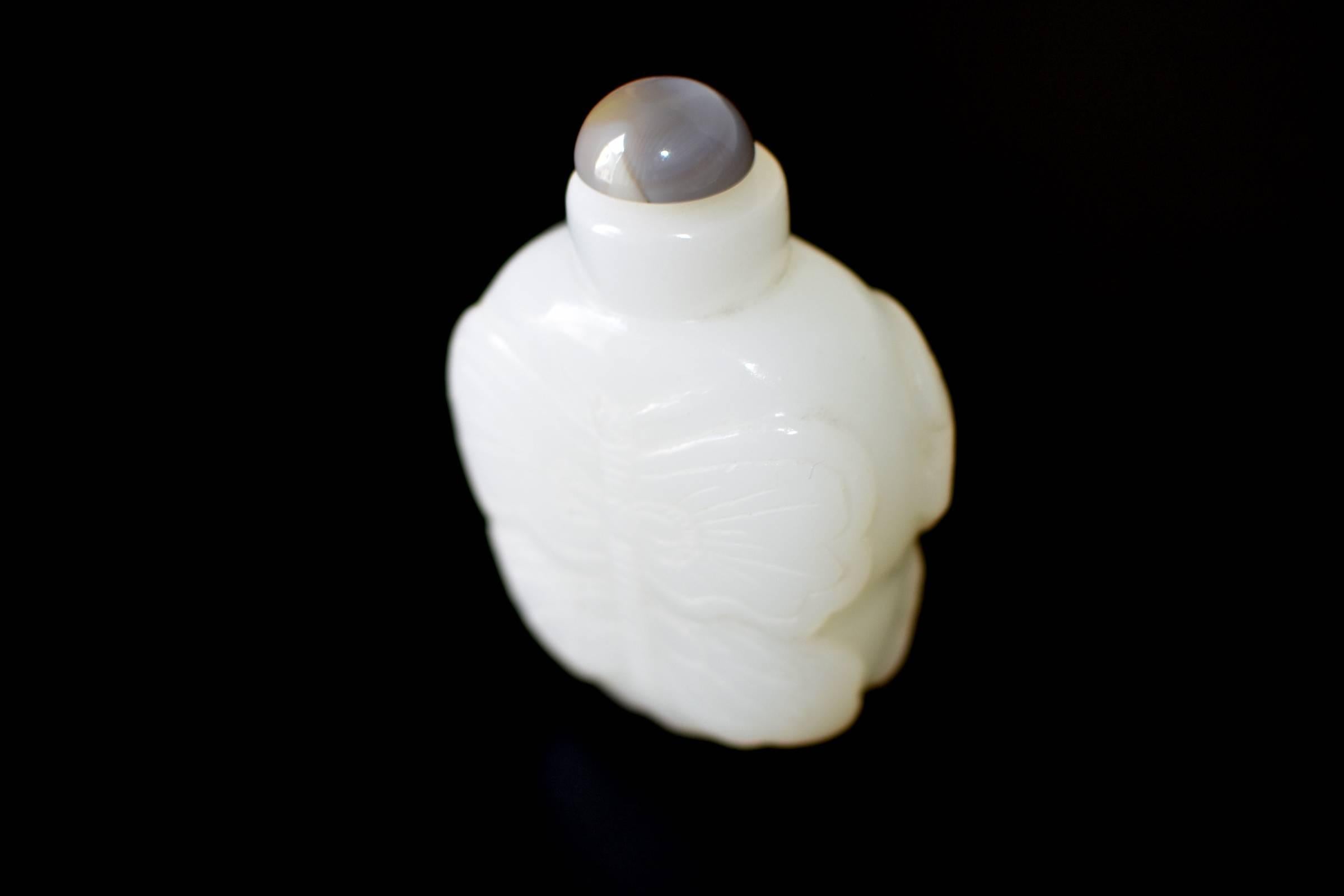 A large snuff bottle in white jade from china's He Tian region.

The best white jade in the world is called "mutton fat", for its pure white color and oily, waxy luster. The most valuable ones come from He Tian, a town in Northwest China